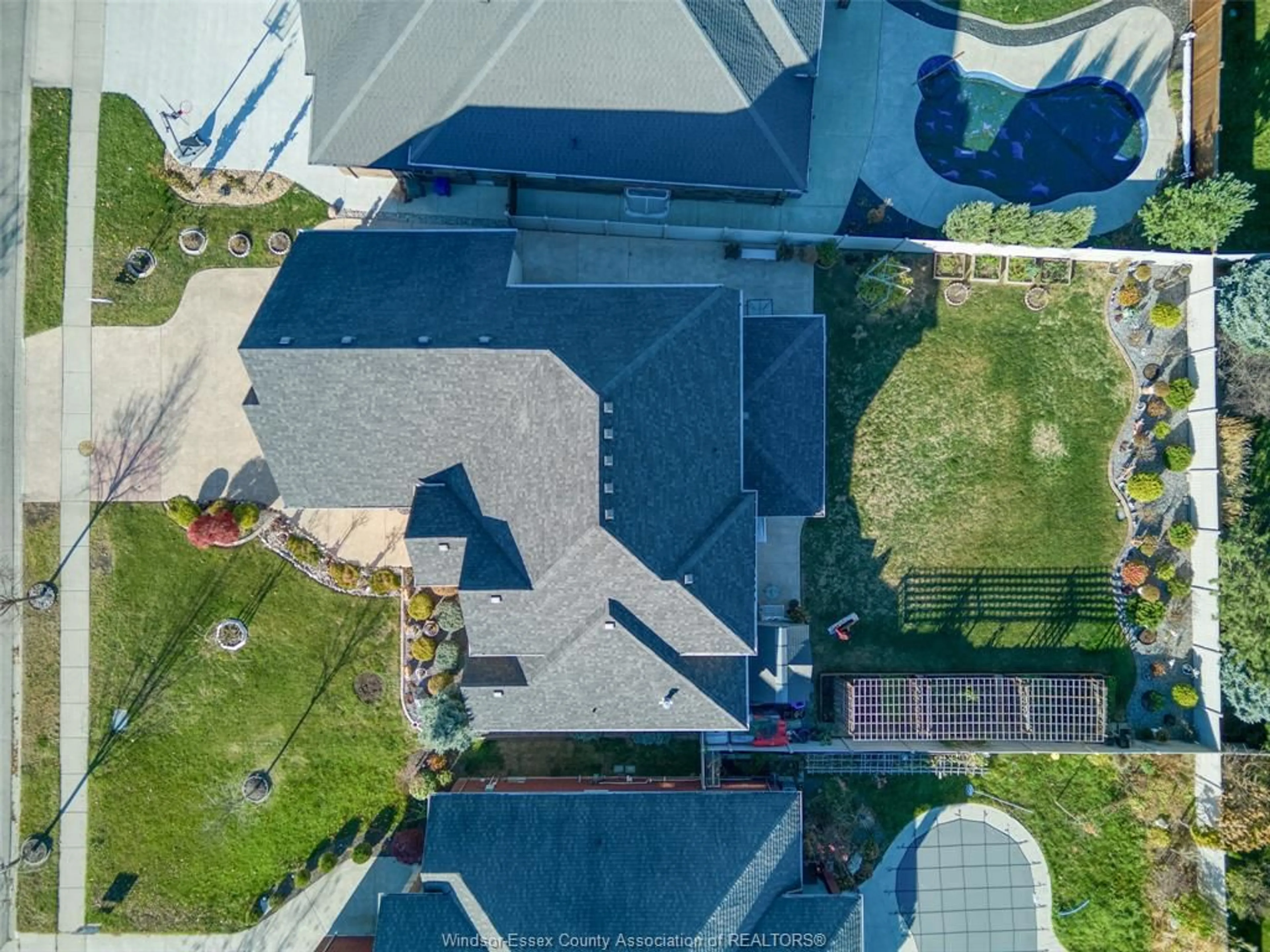 A pic from outside/outdoor area/front of a property/back of a property/a pic from drone, street for 374 EVERGREEN Dr, Lakeshore Ontario N0R 1A0