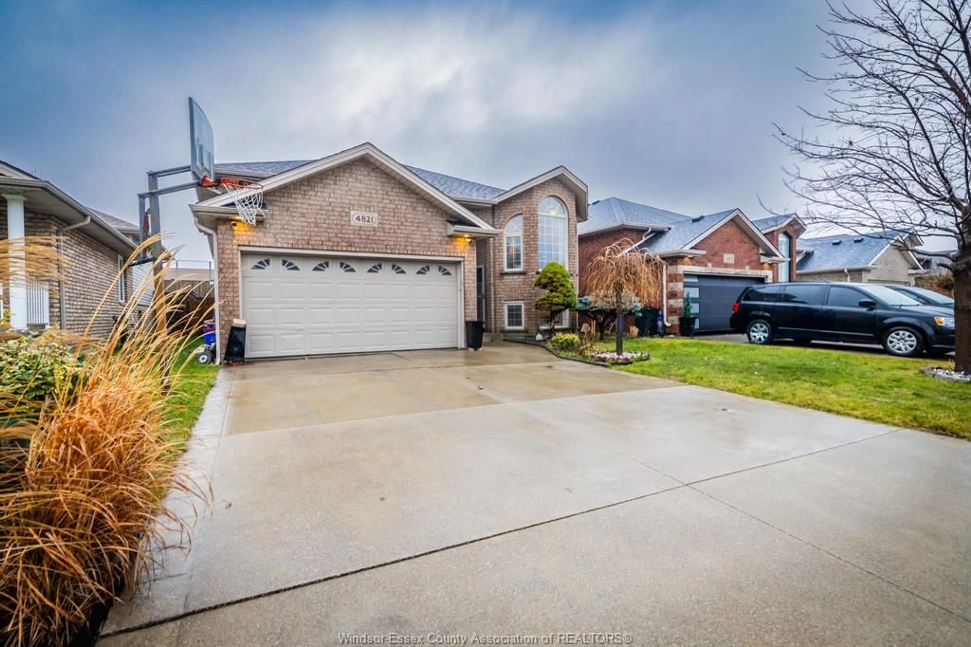 Home with brick exterior material, street for 4821 JULIET Cres, Windsor Ontario N9G 3A6