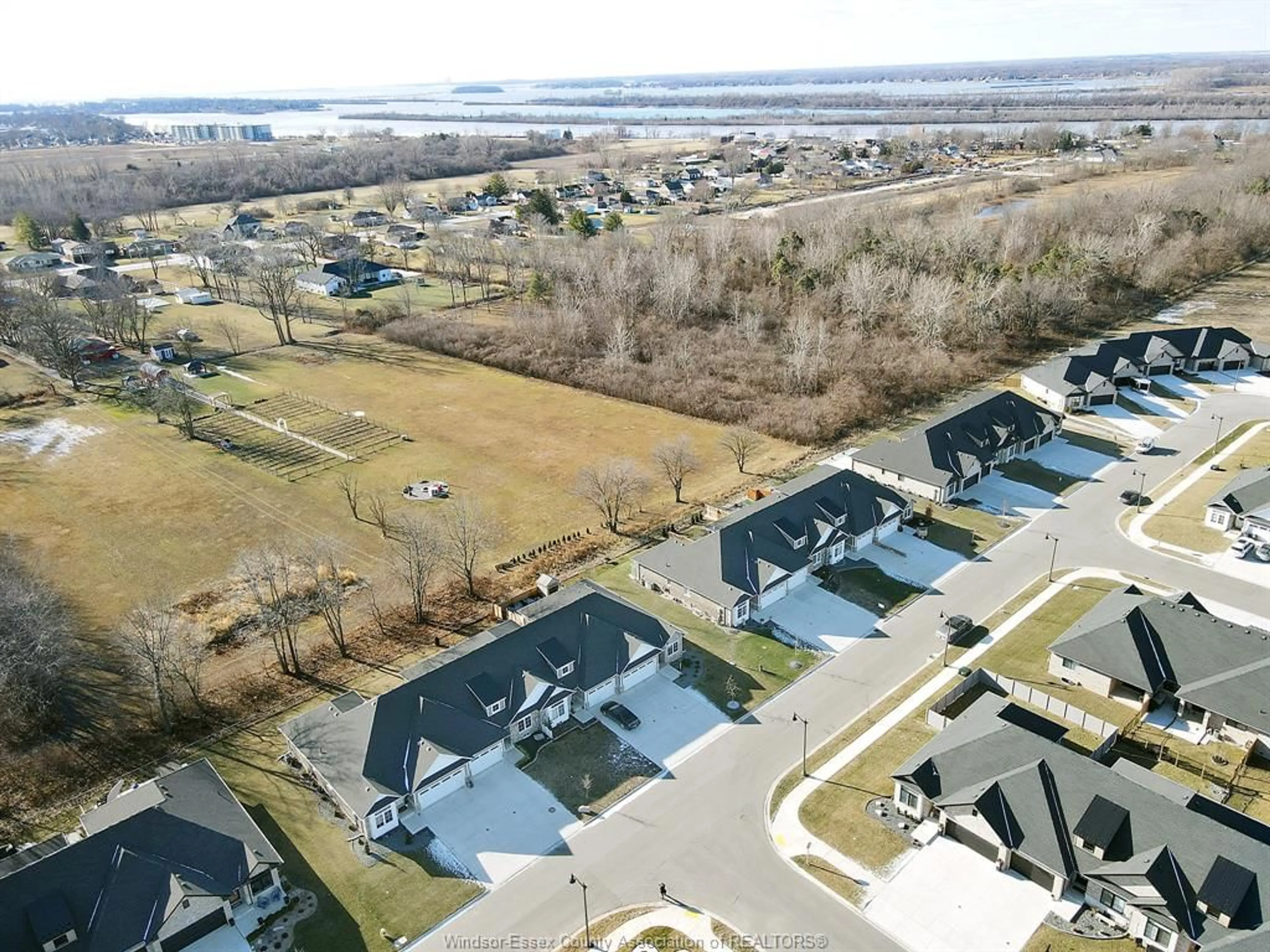 A pic from outside/outdoor area/front of a property/back of a property/a pic from drone, water/lake/river/ocean view for 231 LIVINGSTONE Cres, Amherstburg Ontario N9V 0H1