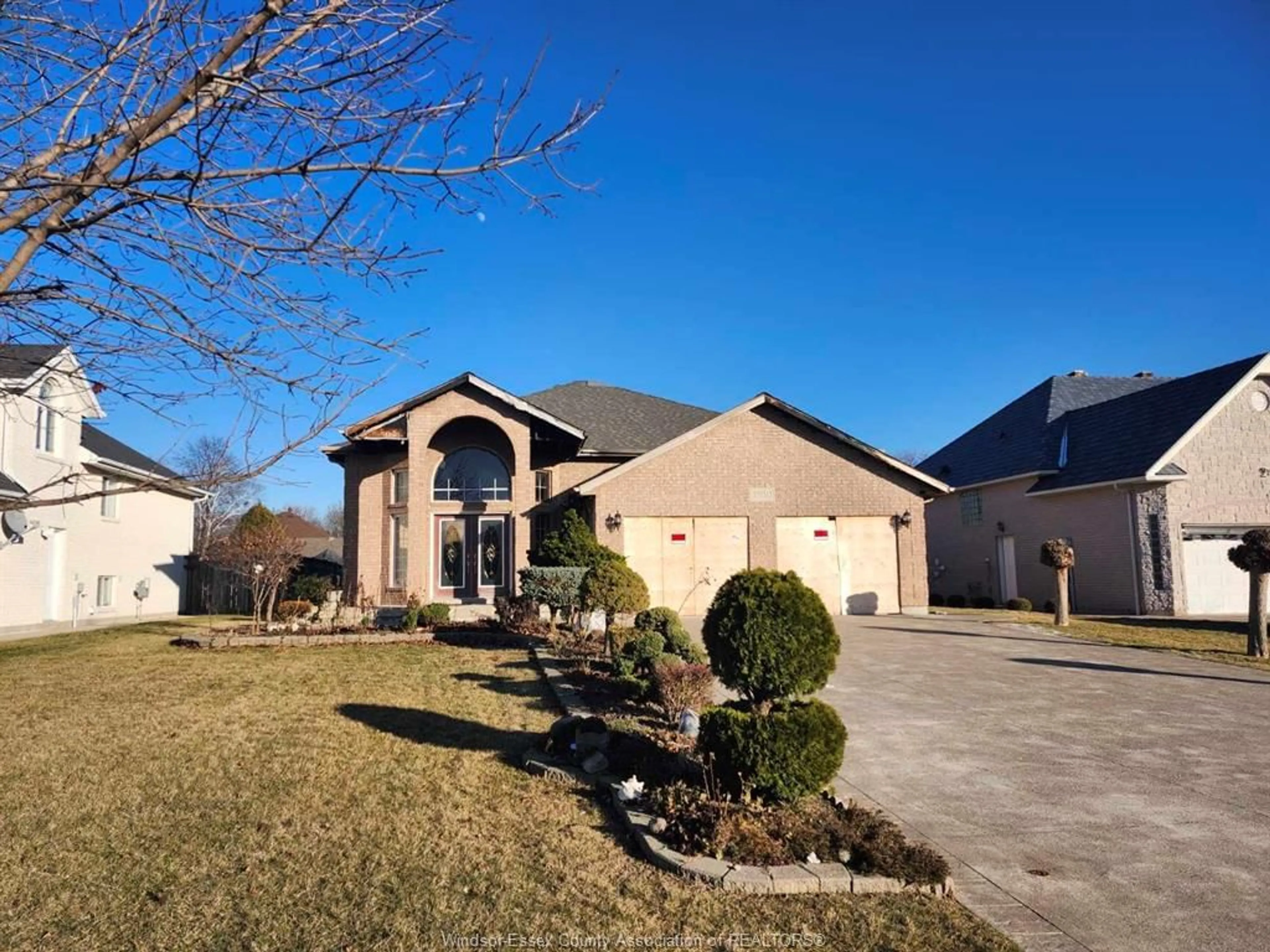 Home with brick exterior material, street for 1930 CORBI Lane, Tecumseh Ontario N8N 5C8