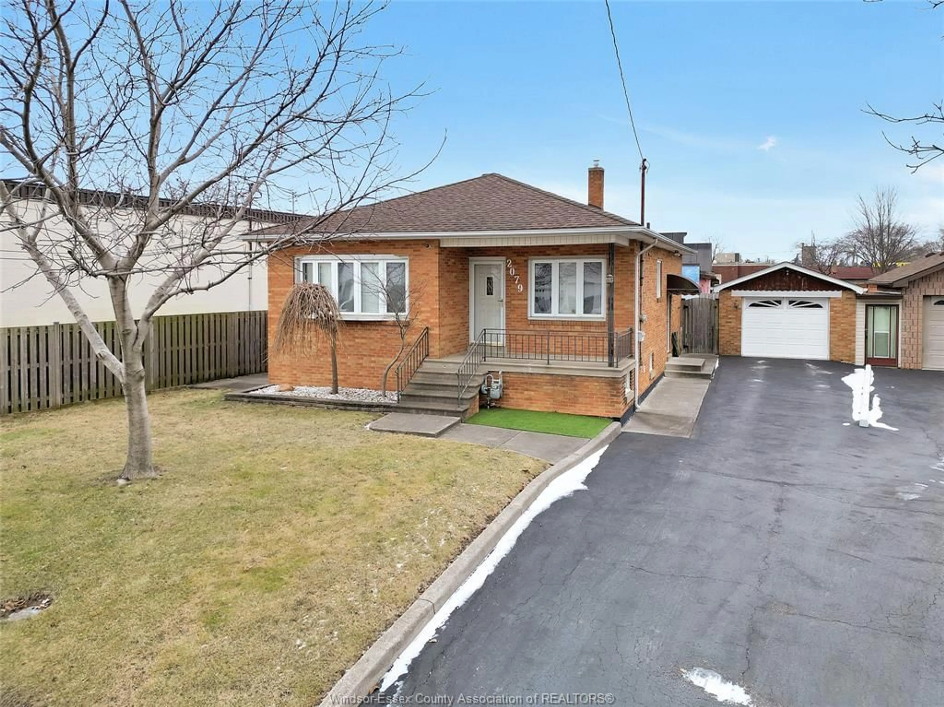 Home with brick exterior material, street for 2079 BALFOUR Blvd, Windsor Ontario N8T 2S6