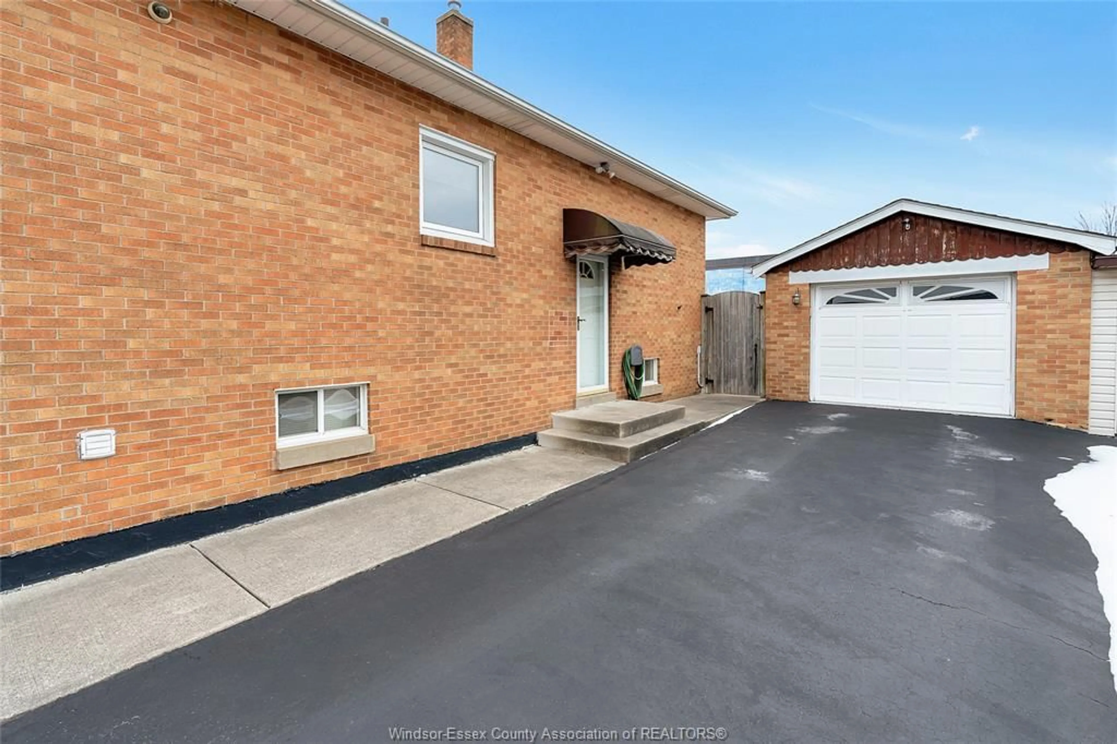 Home with brick exterior material, street for 2079 BALFOUR Blvd, Windsor Ontario N8T 2S6