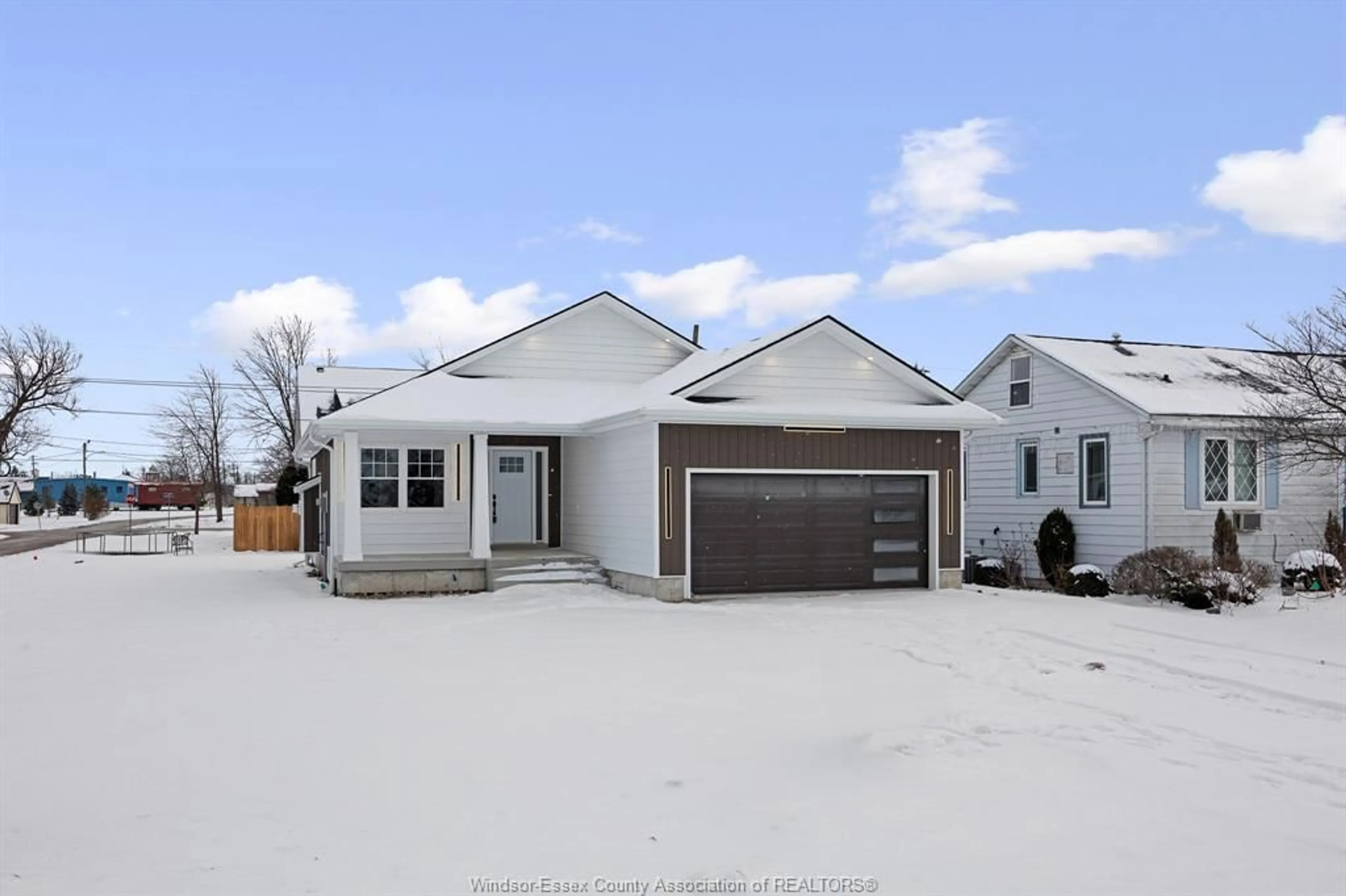 Home with vinyl exterior material, street for 70 MEDORA Ave, Essex Ontario N8M 2X9