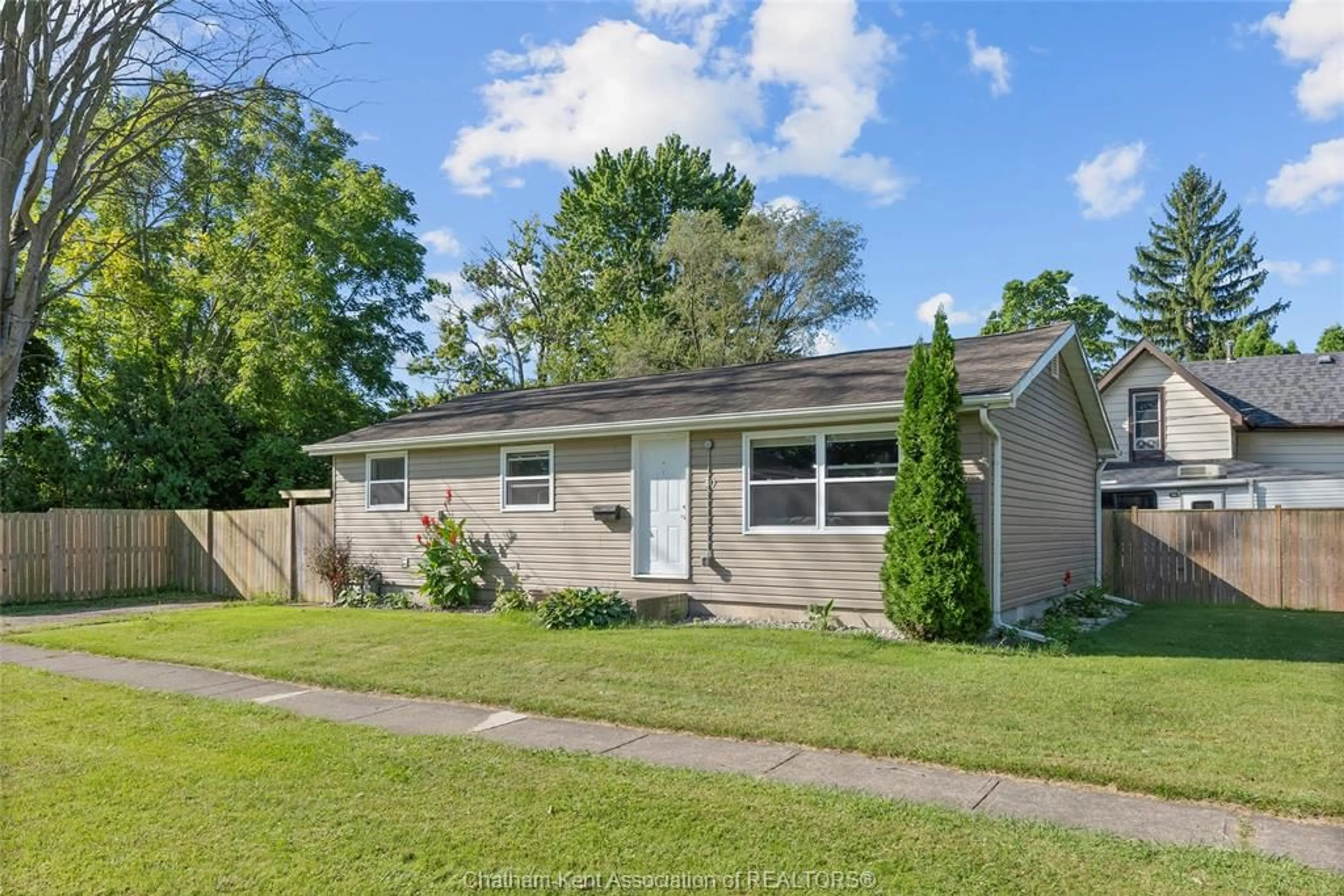 Home with vinyl exterior material, street for 30 Wilkinson St, Chatham Ontario N7M 4X5