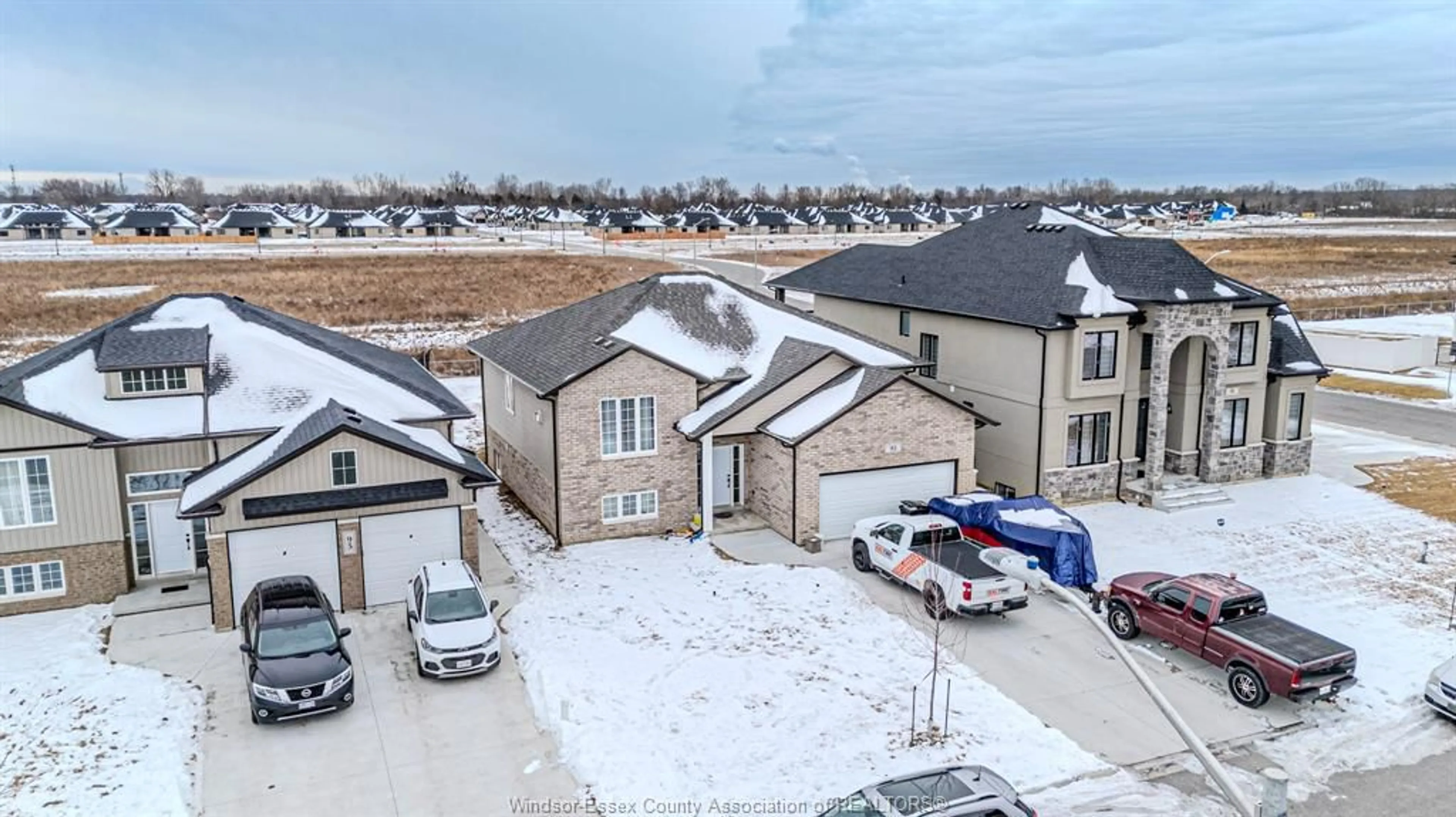 A pic from outside/outdoor area/front of a property/back of a property/a pic from drone, street for 93 KINGSBRIDGE, Amherstburg Ontario N9V 4B6