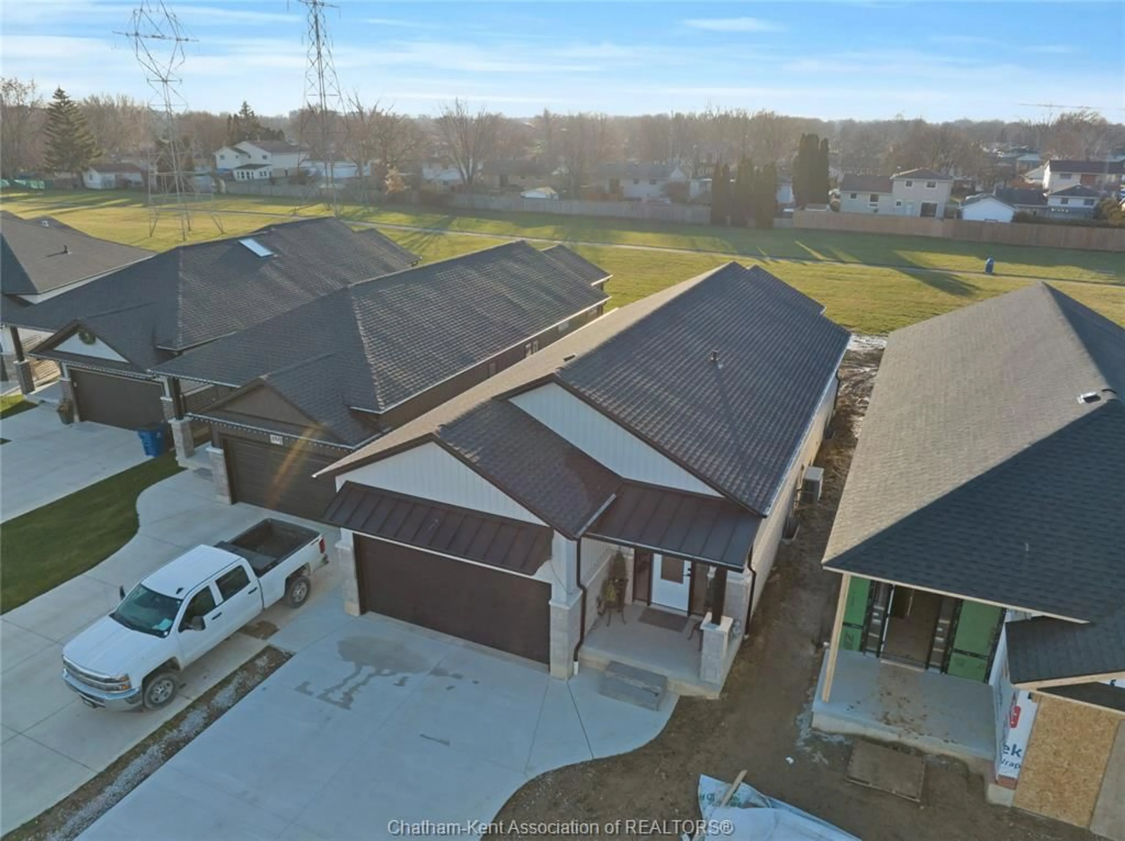 A pic from outside/outdoor area/front of a property/back of a property/a pic from drone, street for 80 Cabot Trail, Chatham Ontario N7M 0A4