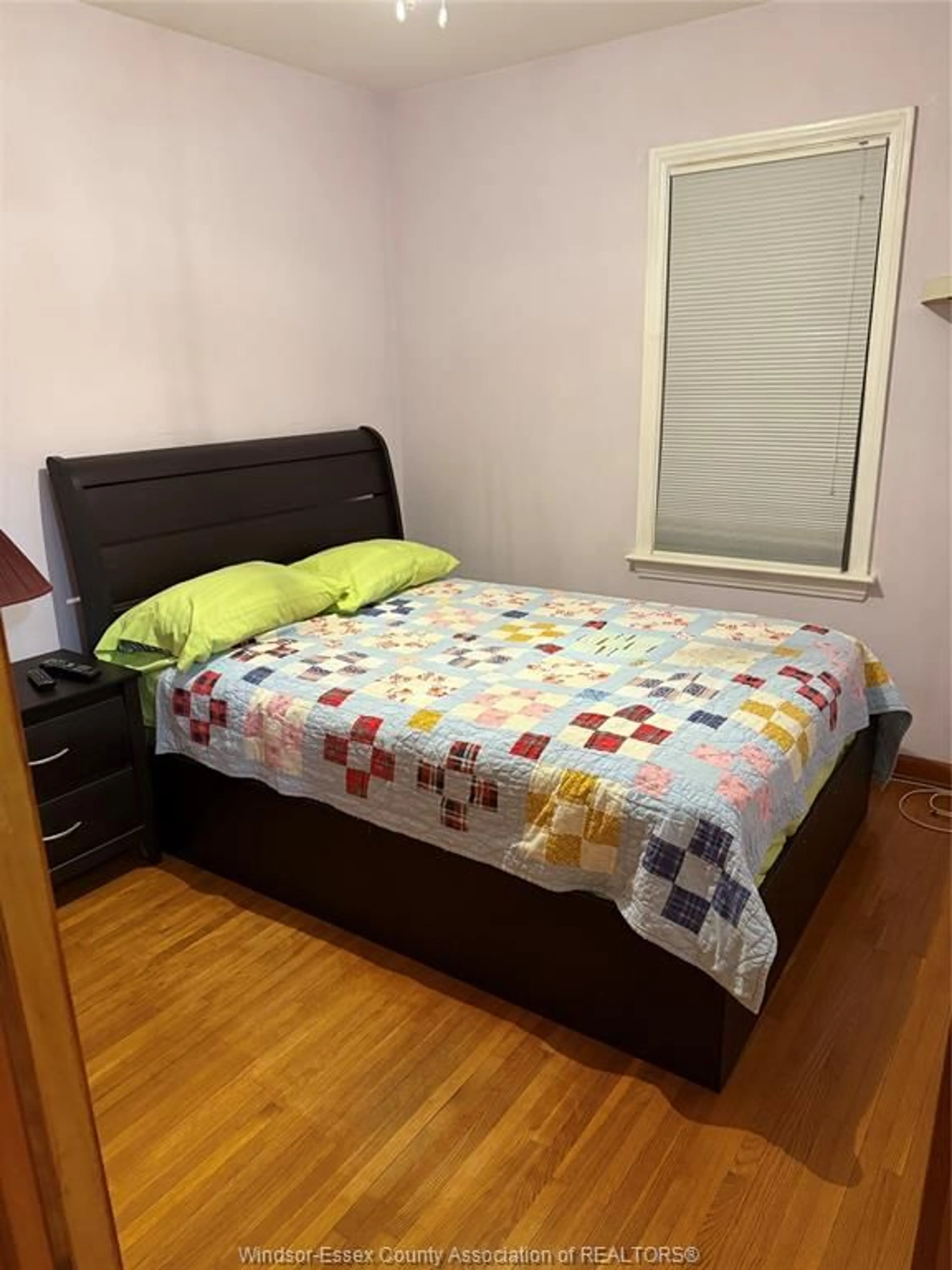 Bedroom with bed, wood/laminate floor for 624 VANIER St, Windsor Ontario N8X 3E3