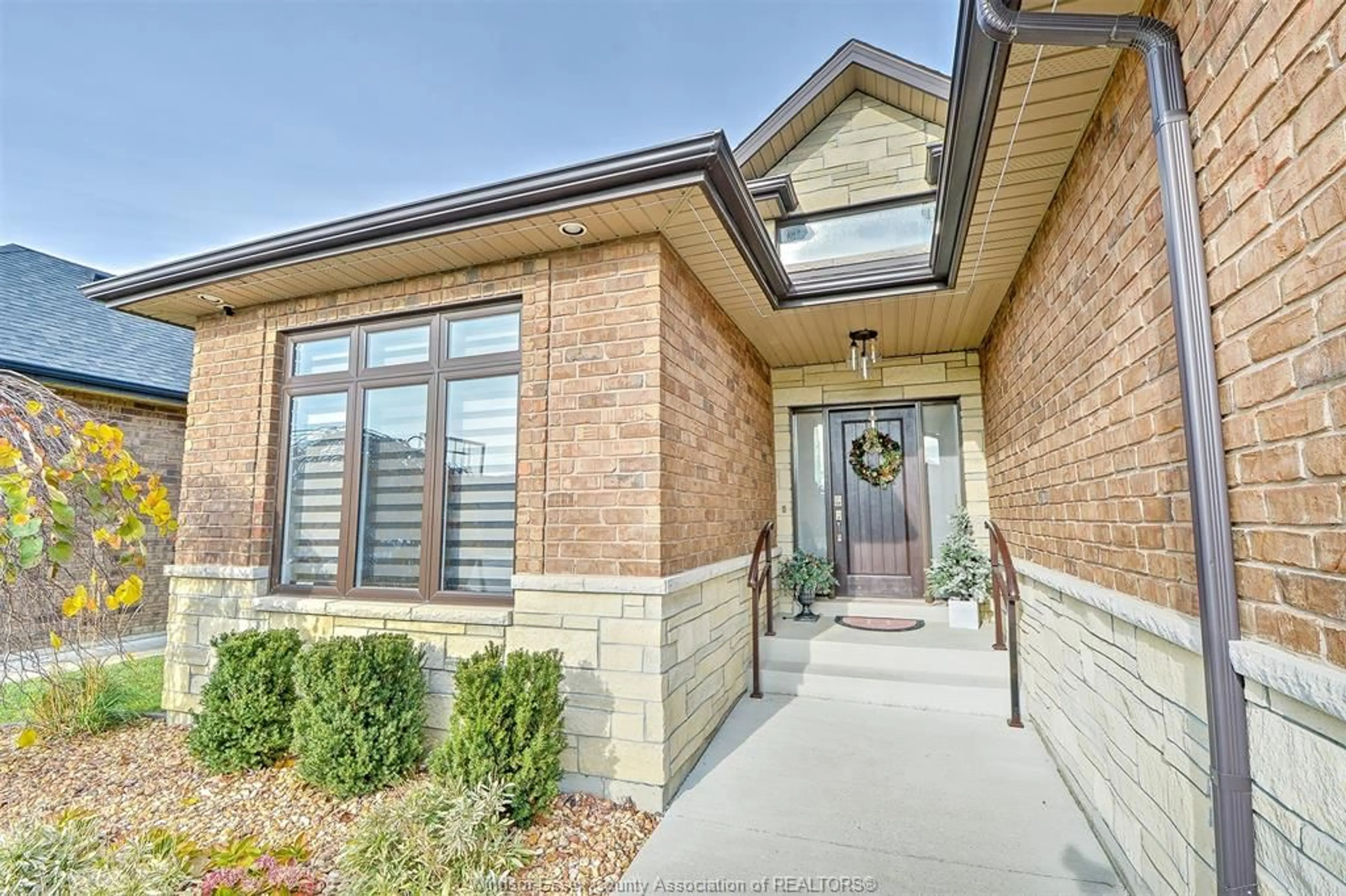 Home with brick exterior material, street for 325 LAKEWOOD Cres, Tecumseh Ontario N8N 1M2