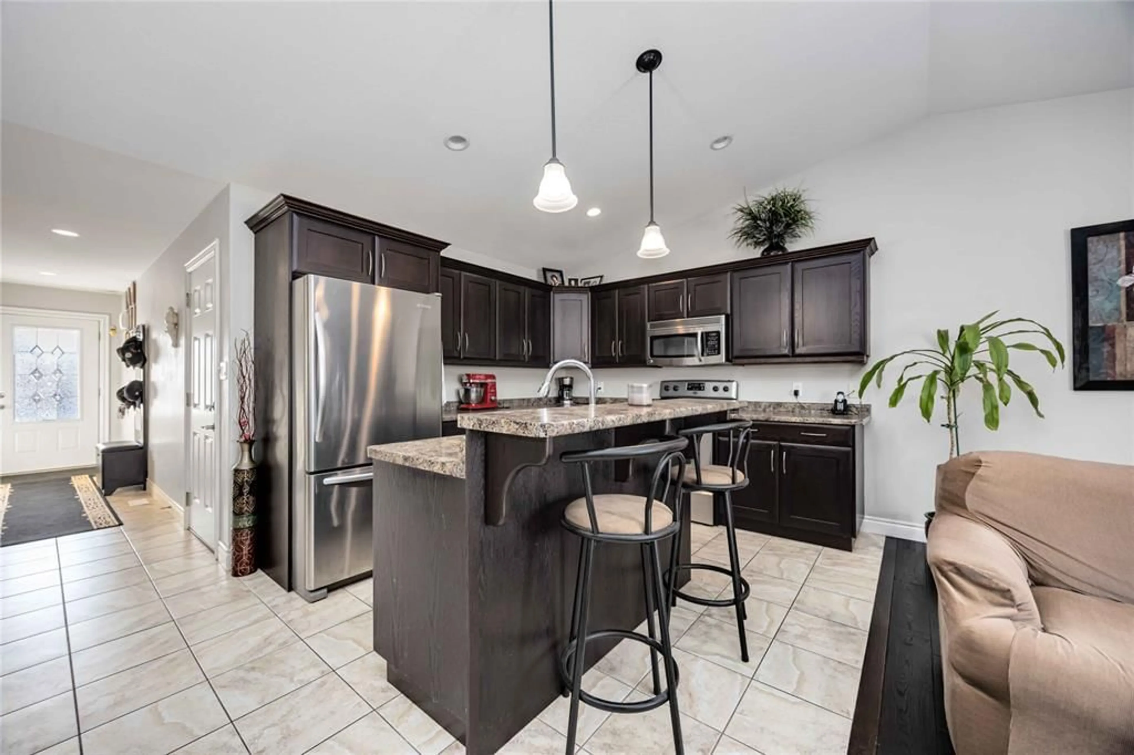 Open concept kitchen, ceramic/tile floor for 812 CARRIAGE Way, Sarnia Ontario N7W 0A5