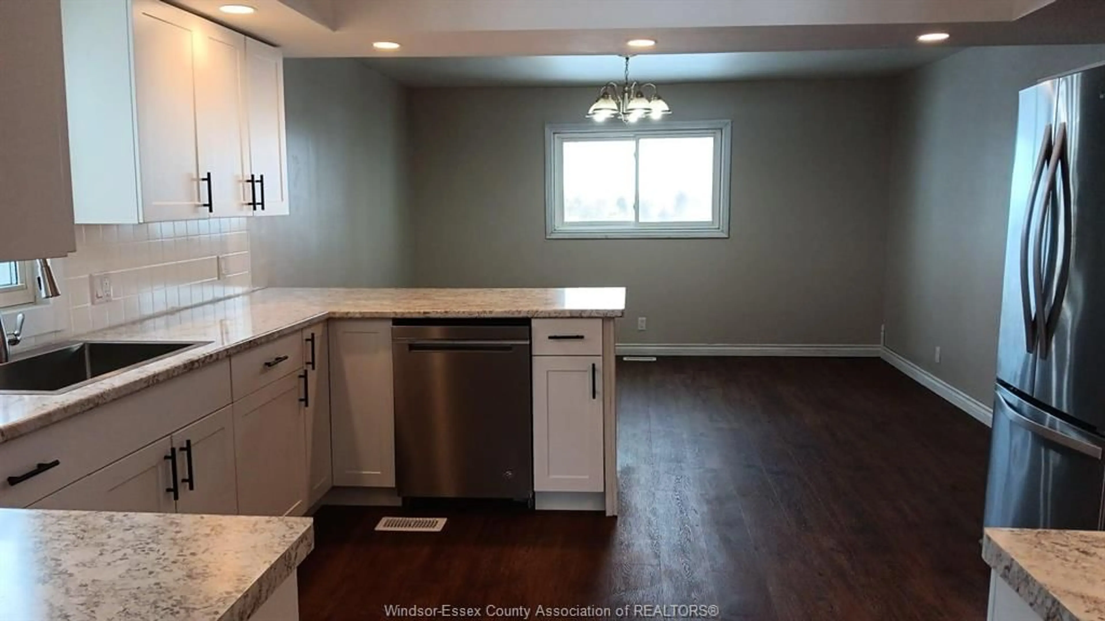 Open concept kitchen, wood/laminate floor for 23805 MERLIN Rd, Pain Court Ontario N0P 2L0