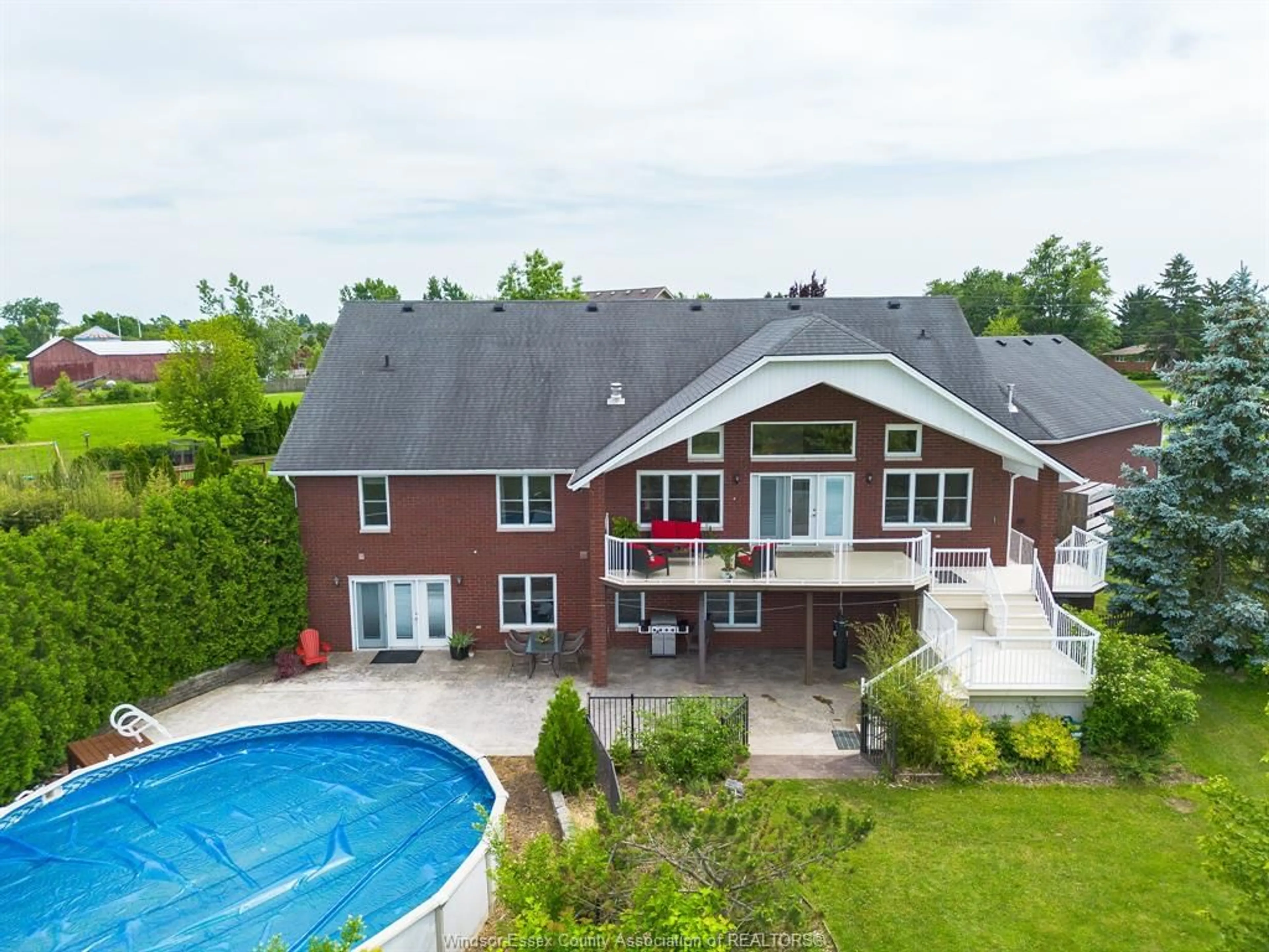 A pic from outside/outdoor area/front of a property/back of a property/a pic from drone, water/lake/river/ocean view for 231 County Rd 34, Cottam Ontario N0R1B0