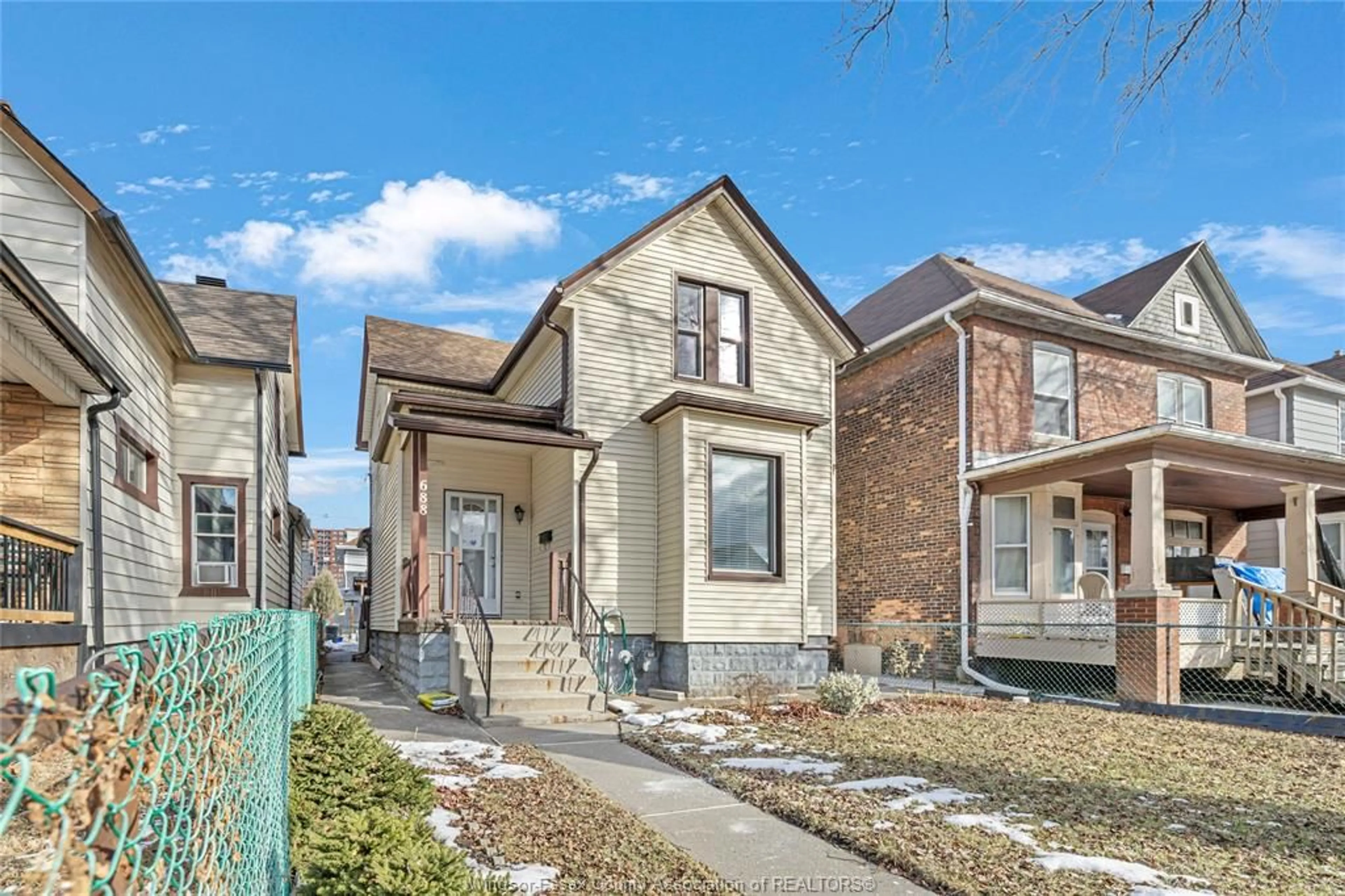 Home with brick exterior material, street for 688 DOUGALL, Windsor Ontario N9A 4P8