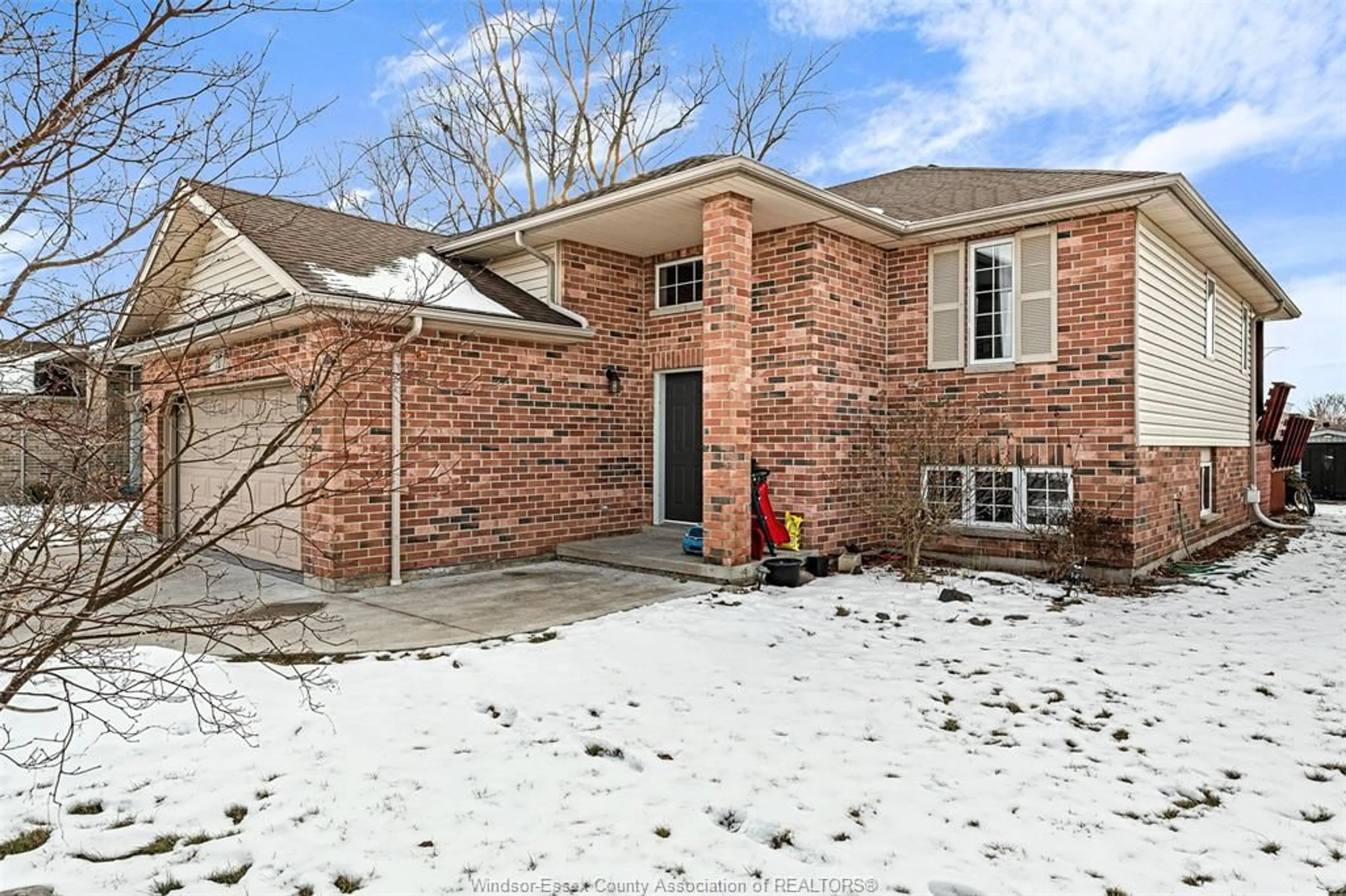 Home with brick exterior material, street for 717 HELENA Cres, Belle River Ontario N8L 0P7