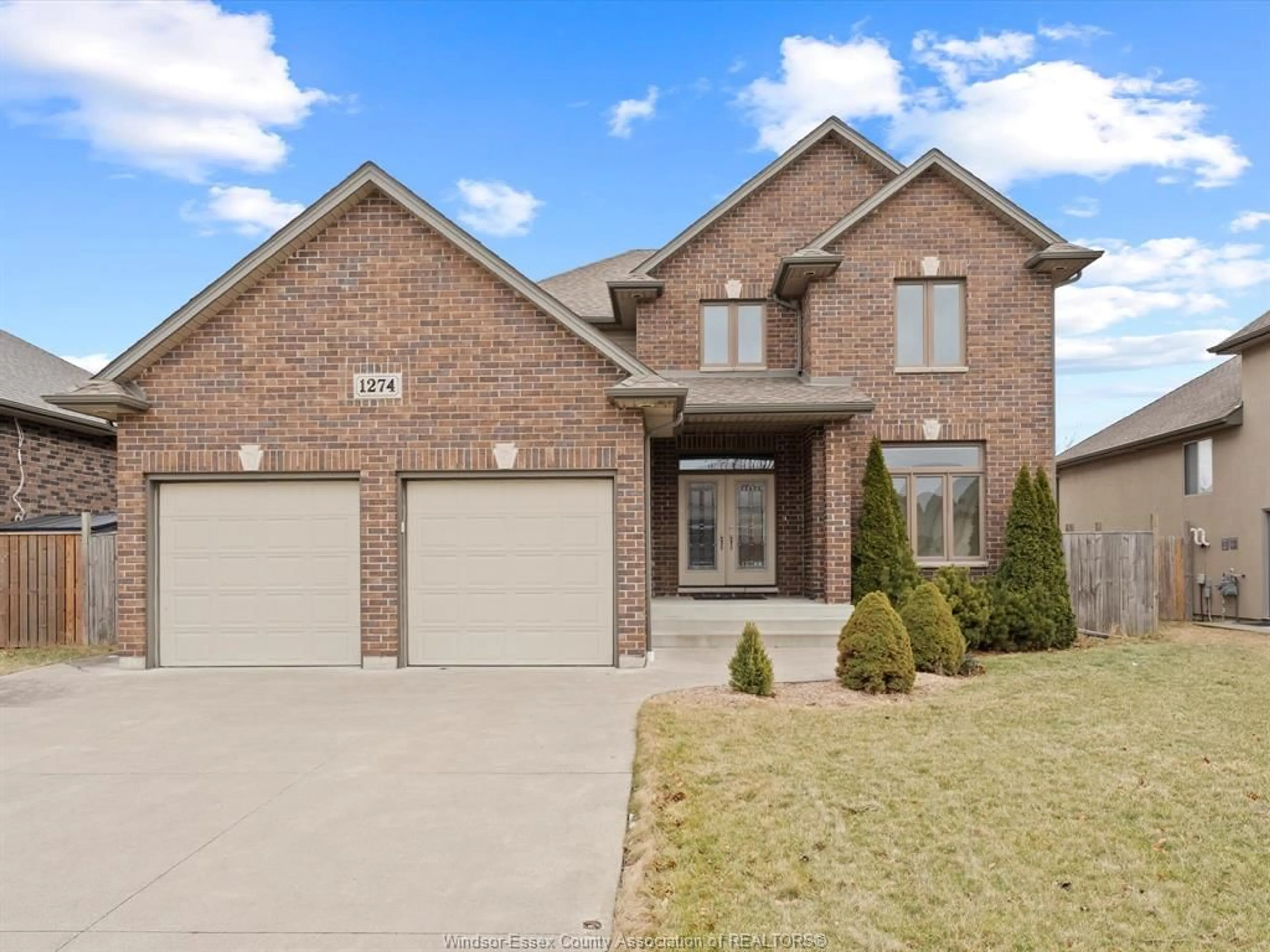 Home with brick exterior material, street for 1274 Deer Run Trail, Lakeshore Ontario N0R 1A0