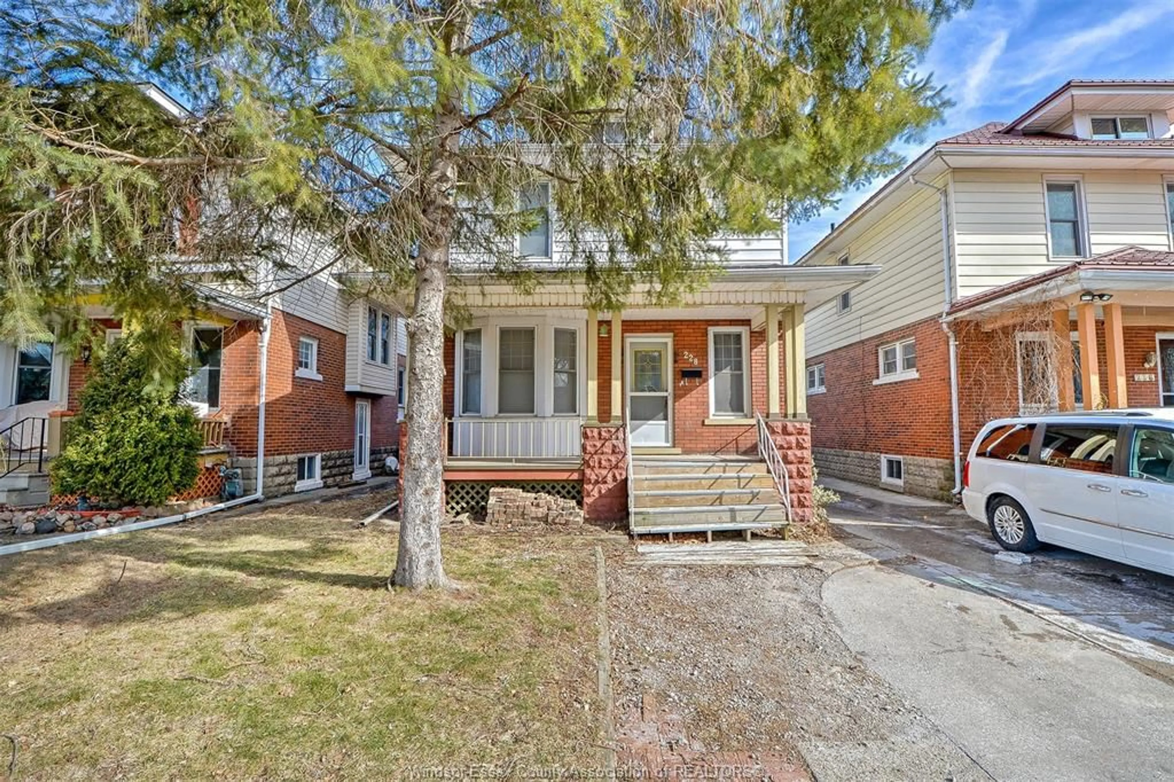 Home with brick exterior material, street for 228 ELM, Windsor Ontario N9A 5G8