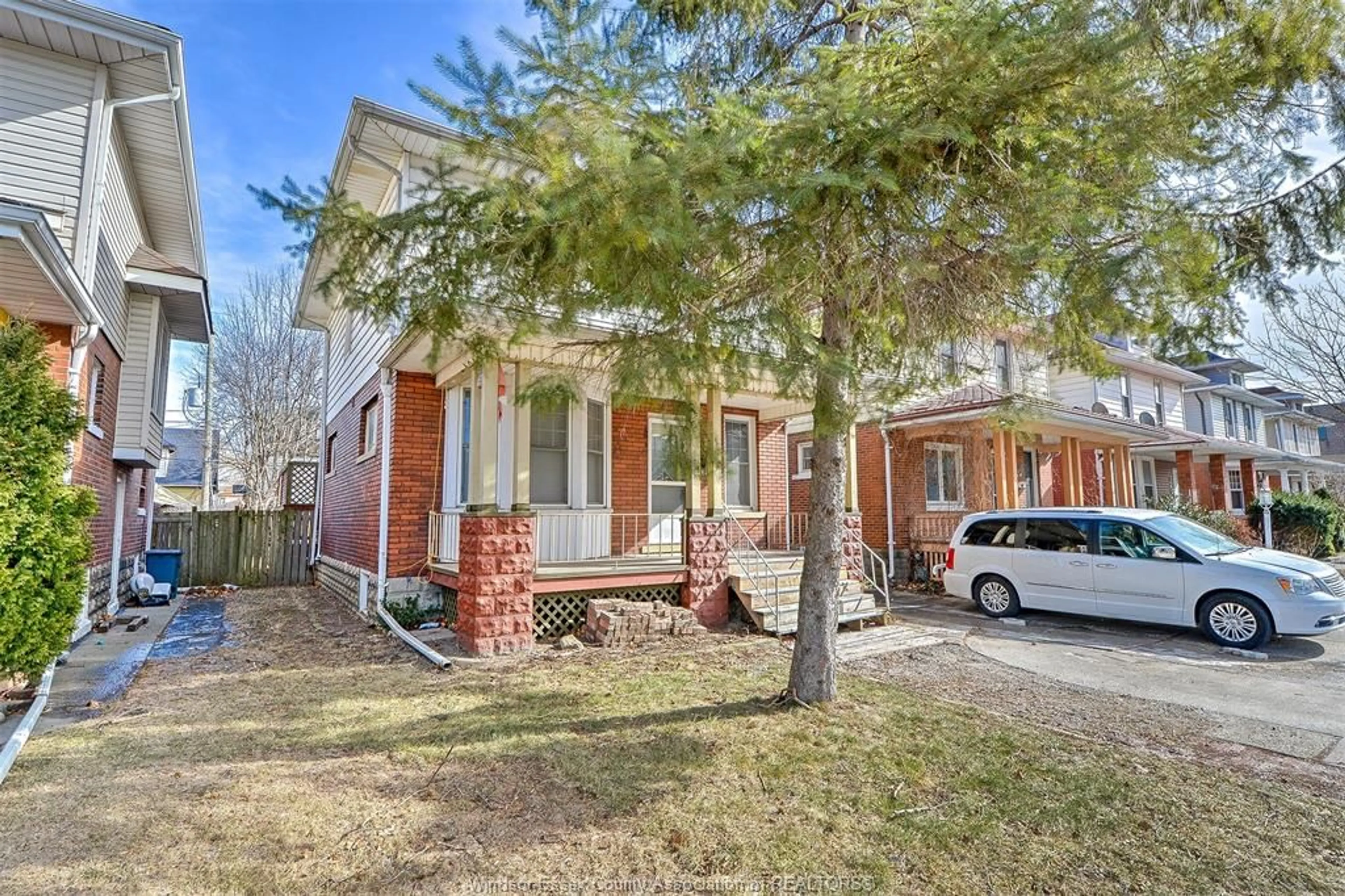 Home with brick exterior material, street for 228 ELM, Windsor Ontario N9A 5G8