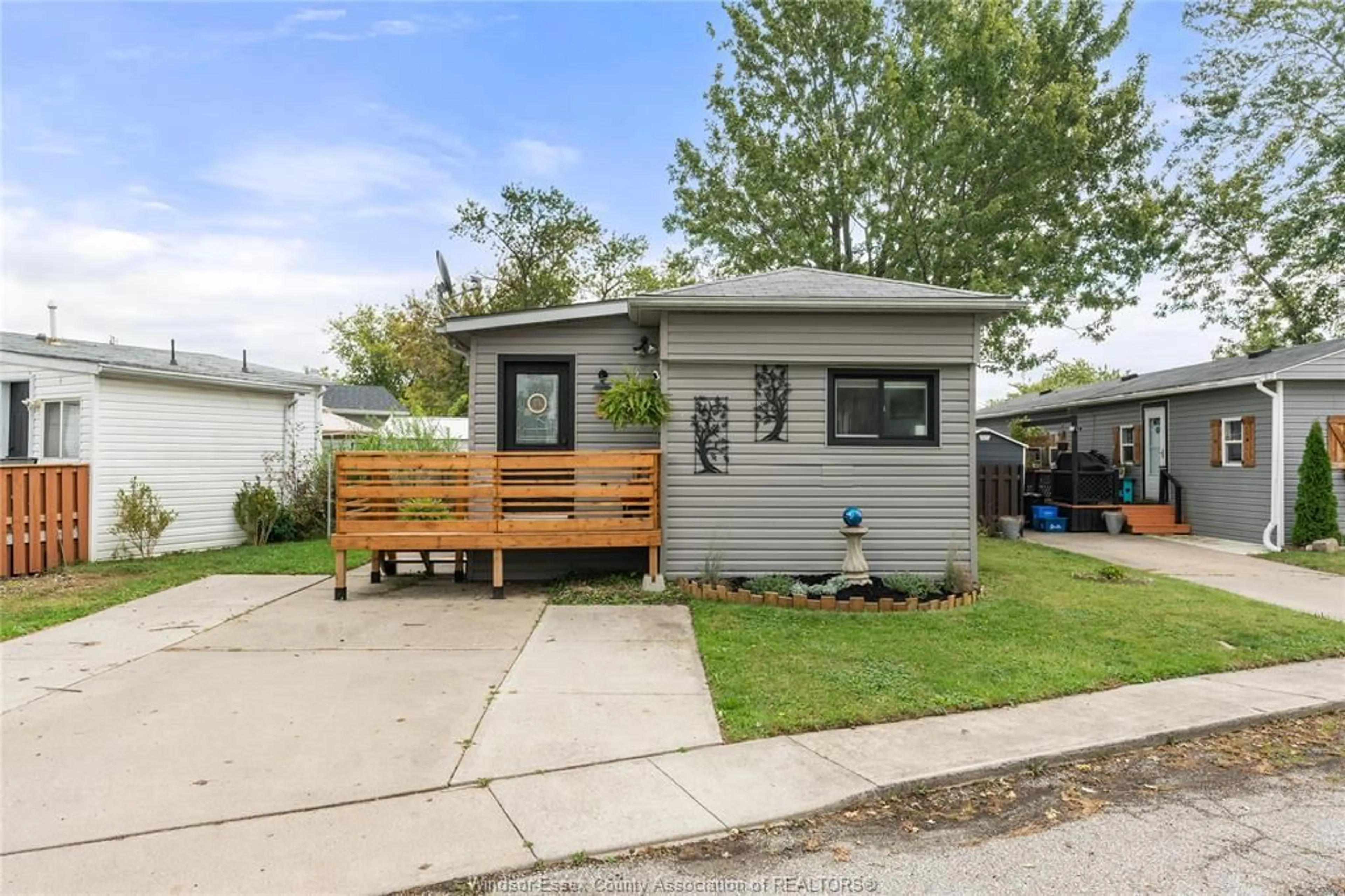 Home with vinyl exterior material, street for 4 CEDAR Cres, McGregor Ontario N0R 1J0