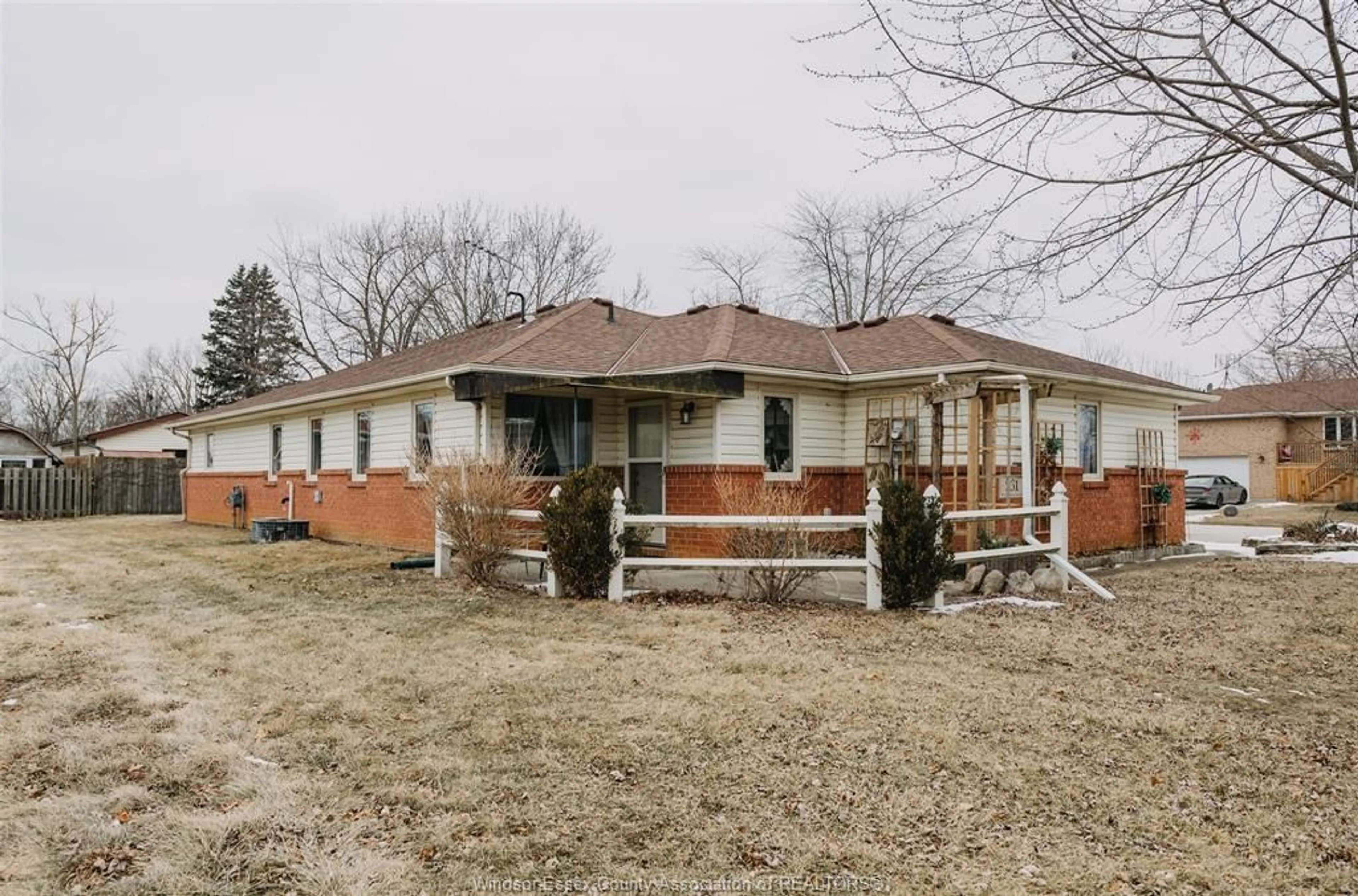 Home with brick exterior material, street for 231 Sunset Dr, Harrow Ontario N0R1G0