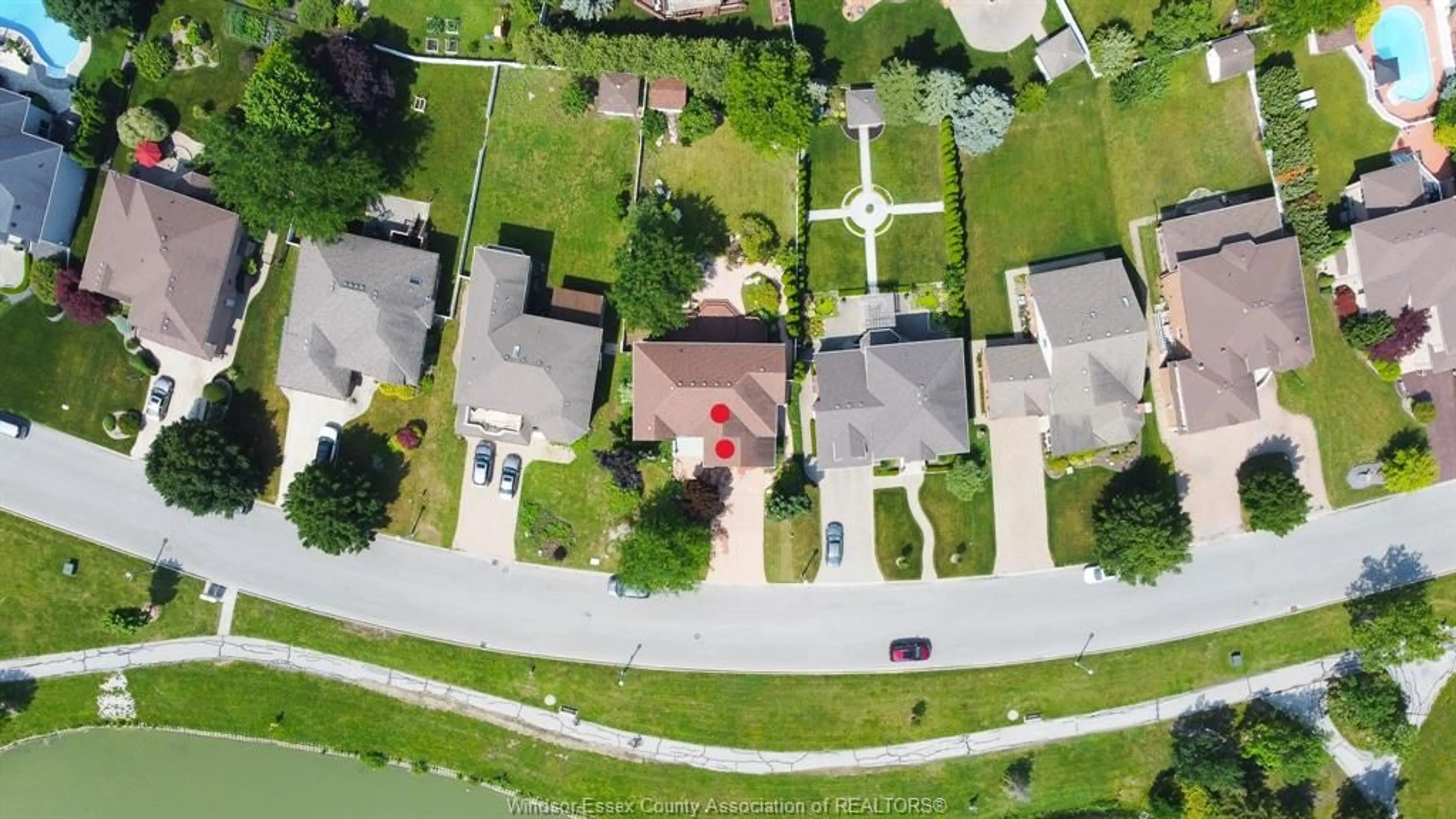 A pic from outside/outdoor area/front of a property/back of a property/a pic from drone, street for 4545 SOUTHWOOD LAKES Blvd, Windsor Ontario N9G 2M6