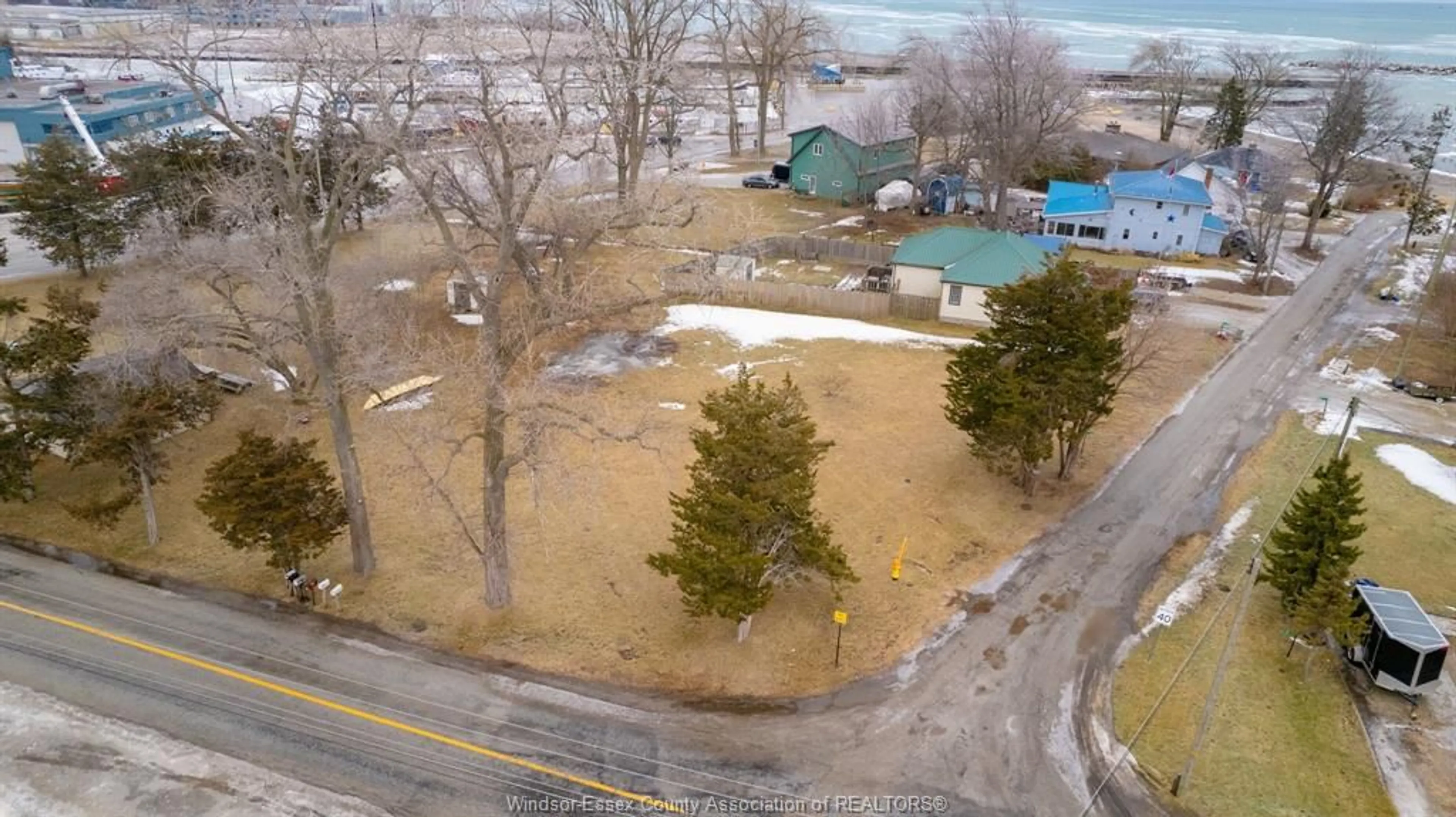 A pic from outside/outdoor area/front of a property/back of a property/a pic from drone, street for 5 BEACH, Leamington Ontario N0P 2P0