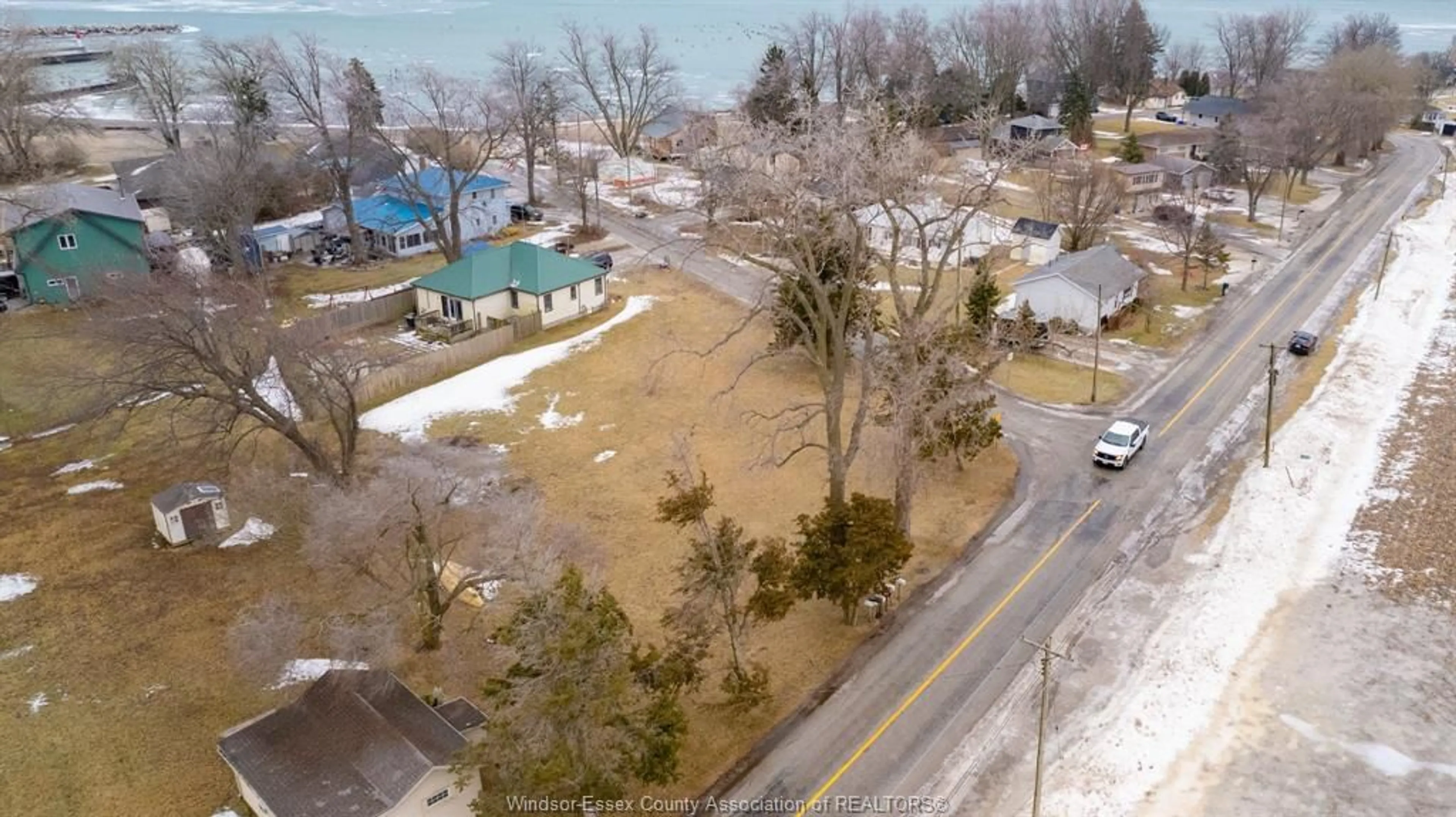 A pic from outside/outdoor area/front of a property/back of a property/a pic from drone, water/lake/river/ocean view for 5 BEACH, Leamington Ontario N0P 2P0