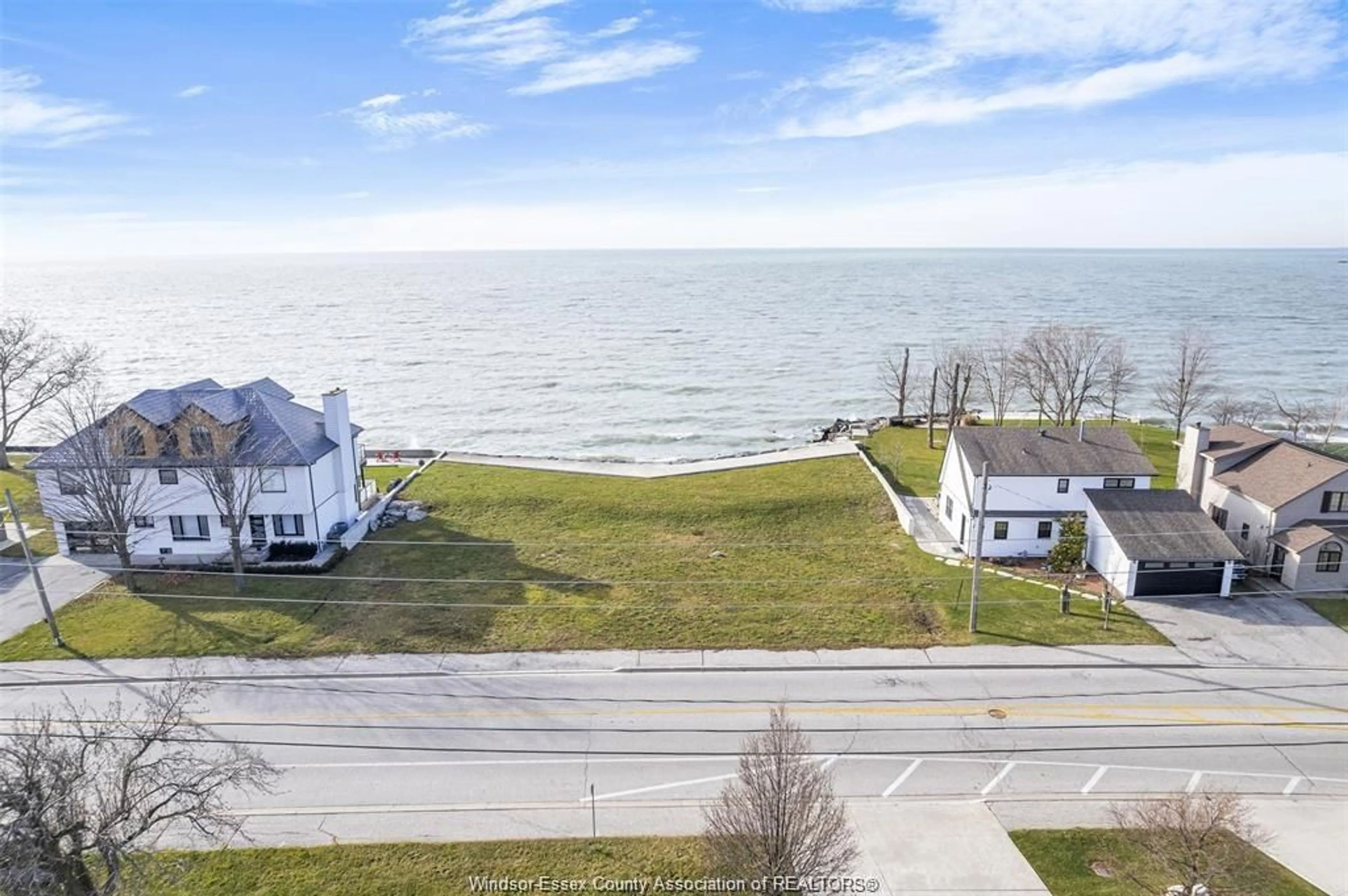 A pic from outside/outdoor area/front of a property/back of a property/a pic from drone, water/lake/river/ocean view for 200 ROBSON Rd #2, Leamington Ontario N8H5R1