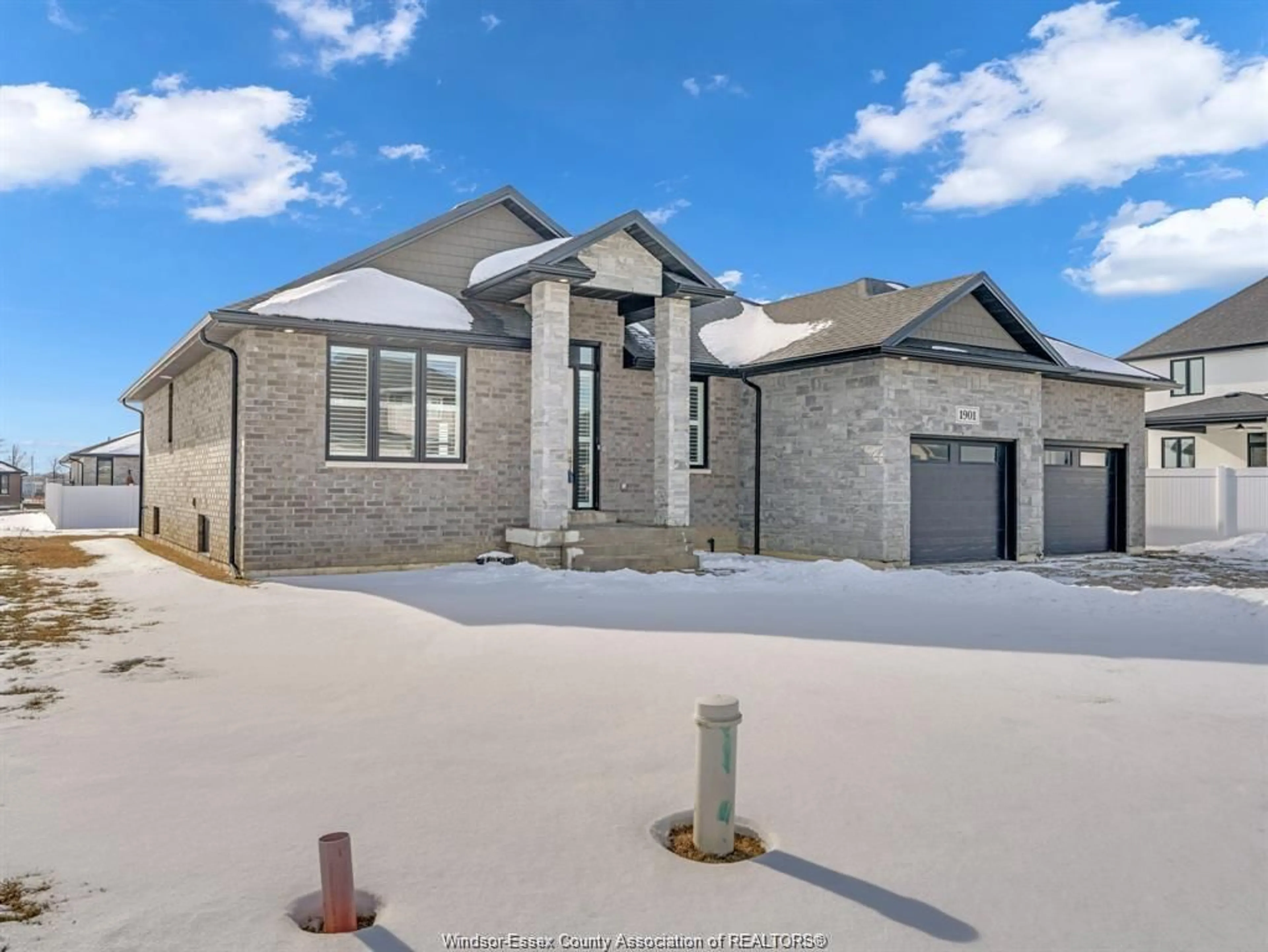 Home with brick exterior material, street for 1901 VILLA CANAL Dr, Kingsville Ontario N9Y 0G5