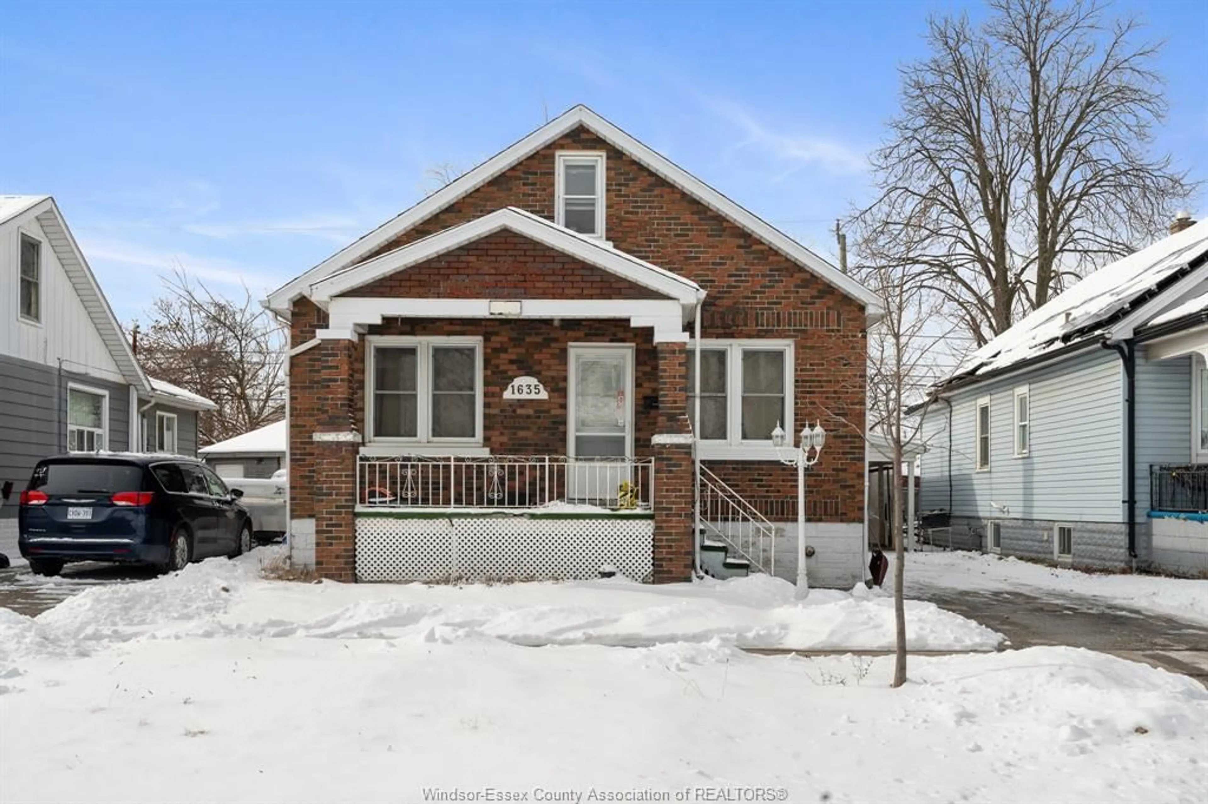 Home with brick exterior material, street for 1635 HICKORY Rd, Windsor Ontario N8Y 3T2