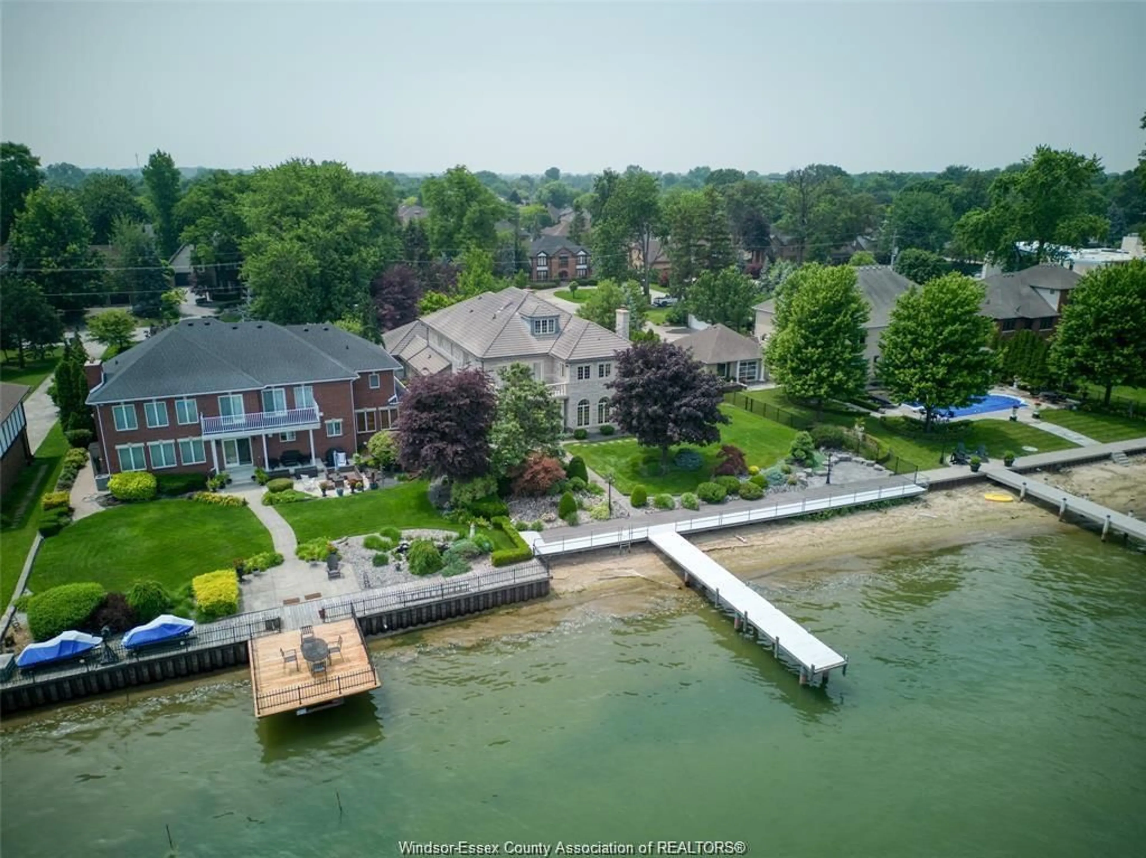 A pic from outside/outdoor area/front of a property/back of a property/a pic from drone, water/lake/river/ocean view for 300 Elmgrove Dr, Lakeshore Ontario N8N 3S4