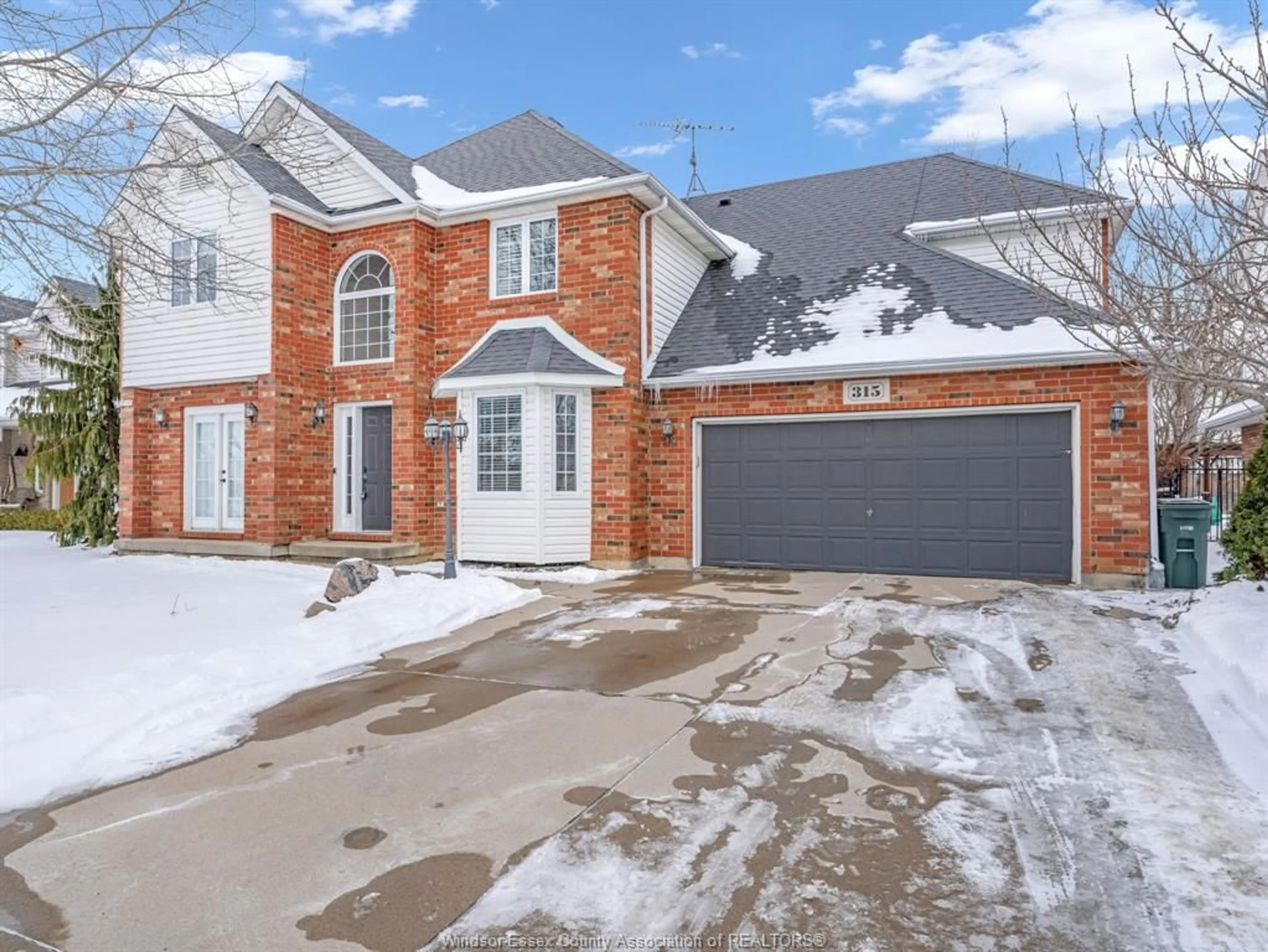 Home with brick exterior material, street for 315 MILLBROOK Dr, Kingsville Ontario N9Y 4A5