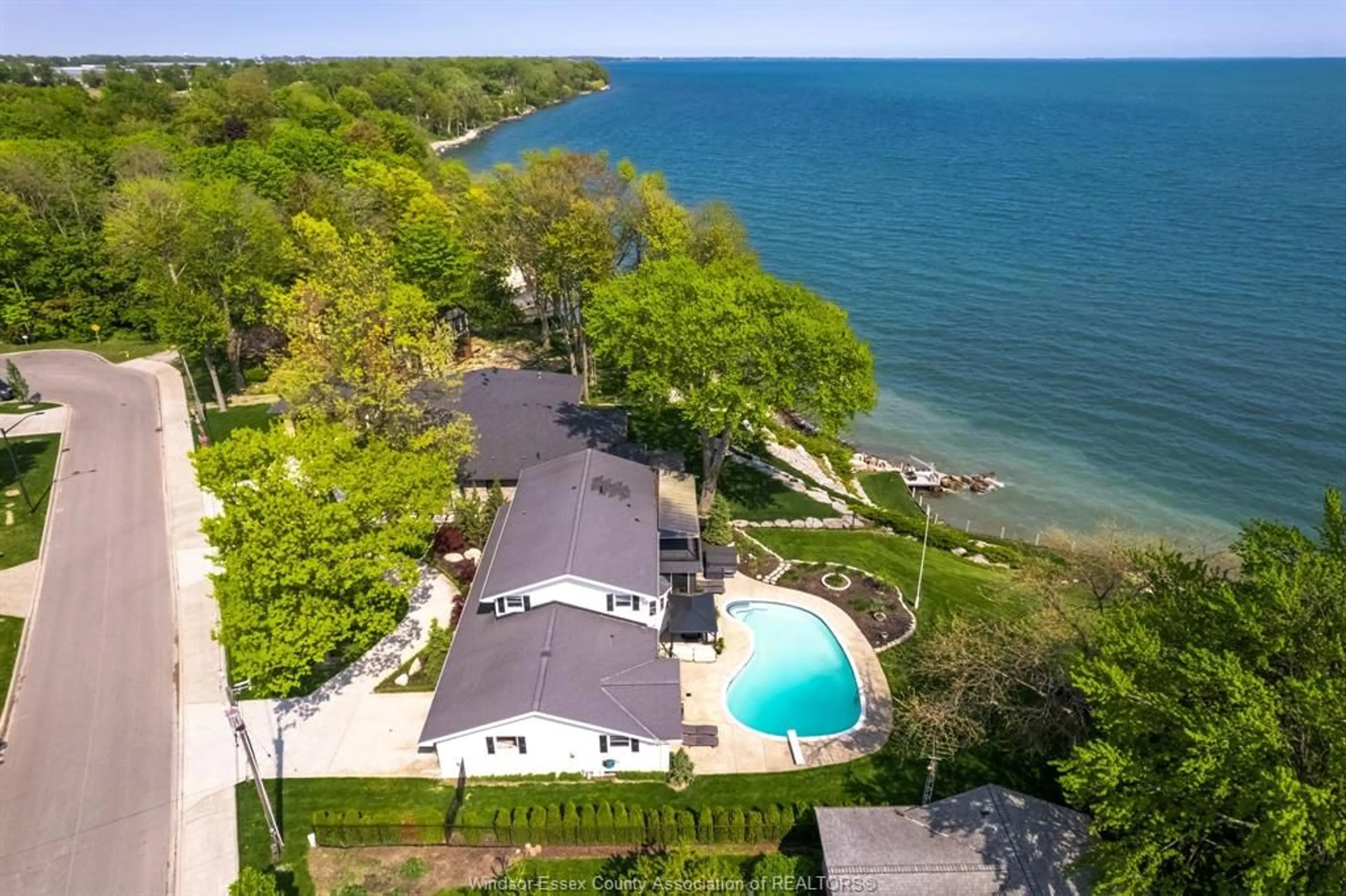 A pic from outside/outdoor area/front of a property/back of a property/a pic from drone, water/lake/river/ocean view for 395 Lakeview, Kingsville Ontario N9Y 2E2