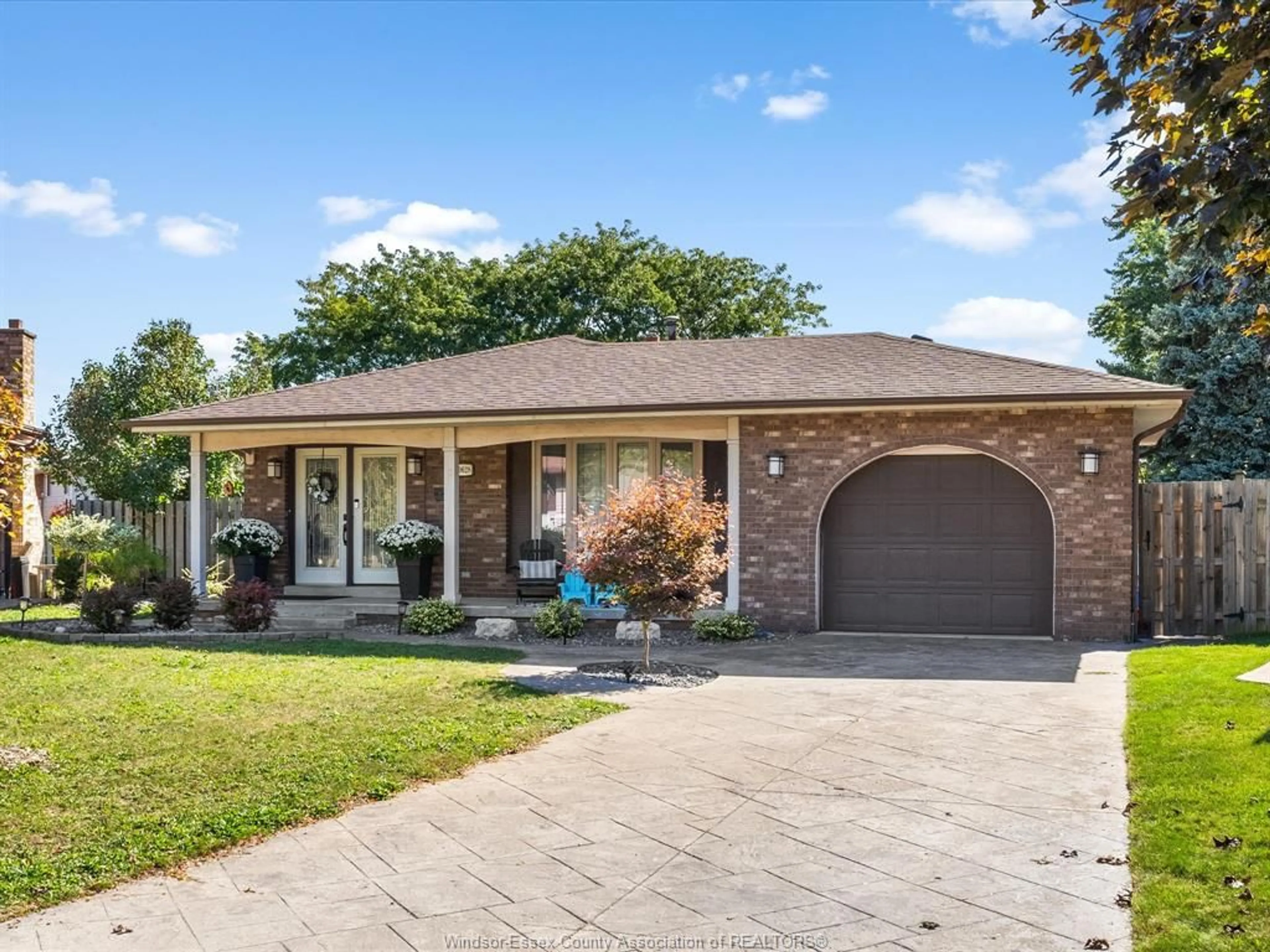 Home with brick exterior material, street for 10628 HALSTEAD Cres, Windsor Ontario N8R 2C4