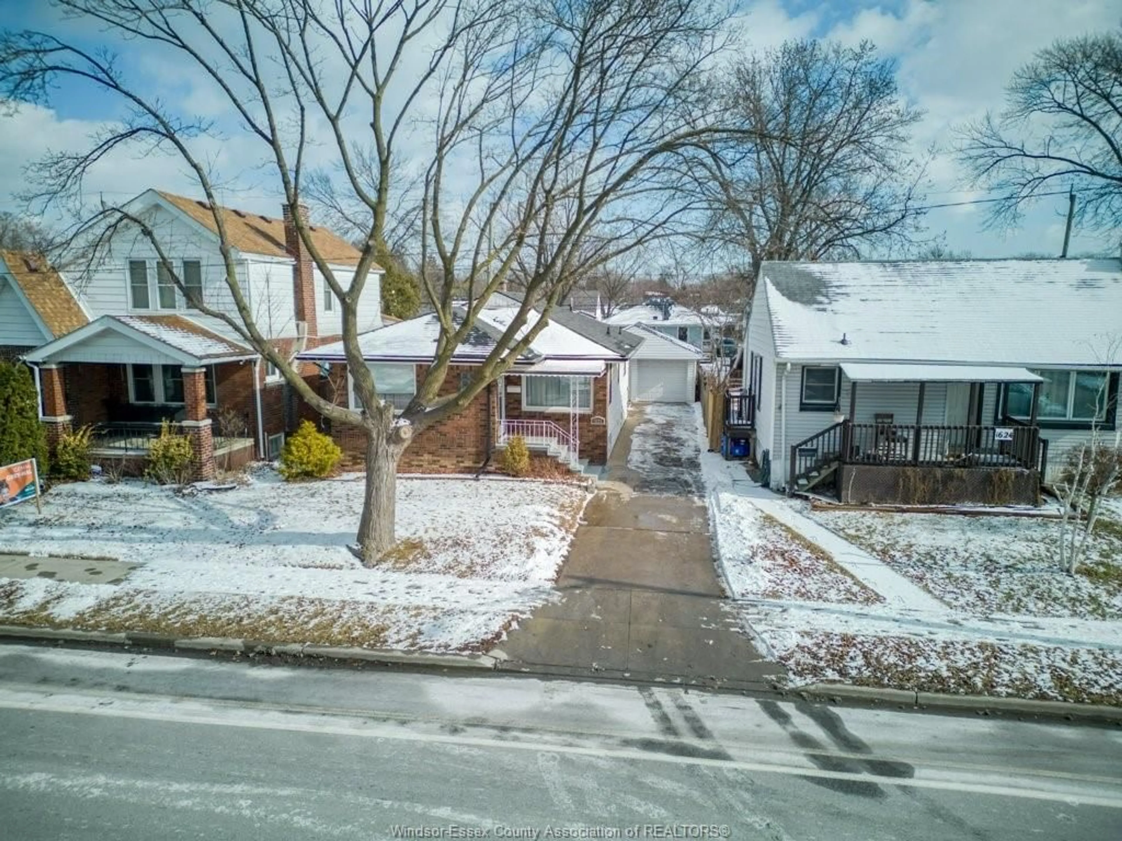 A pic from outside/outdoor area/front of a property/back of a property/a pic from drone, street for 1620 PILLETTE Rd, Windsor Ontario N8Y 3C5