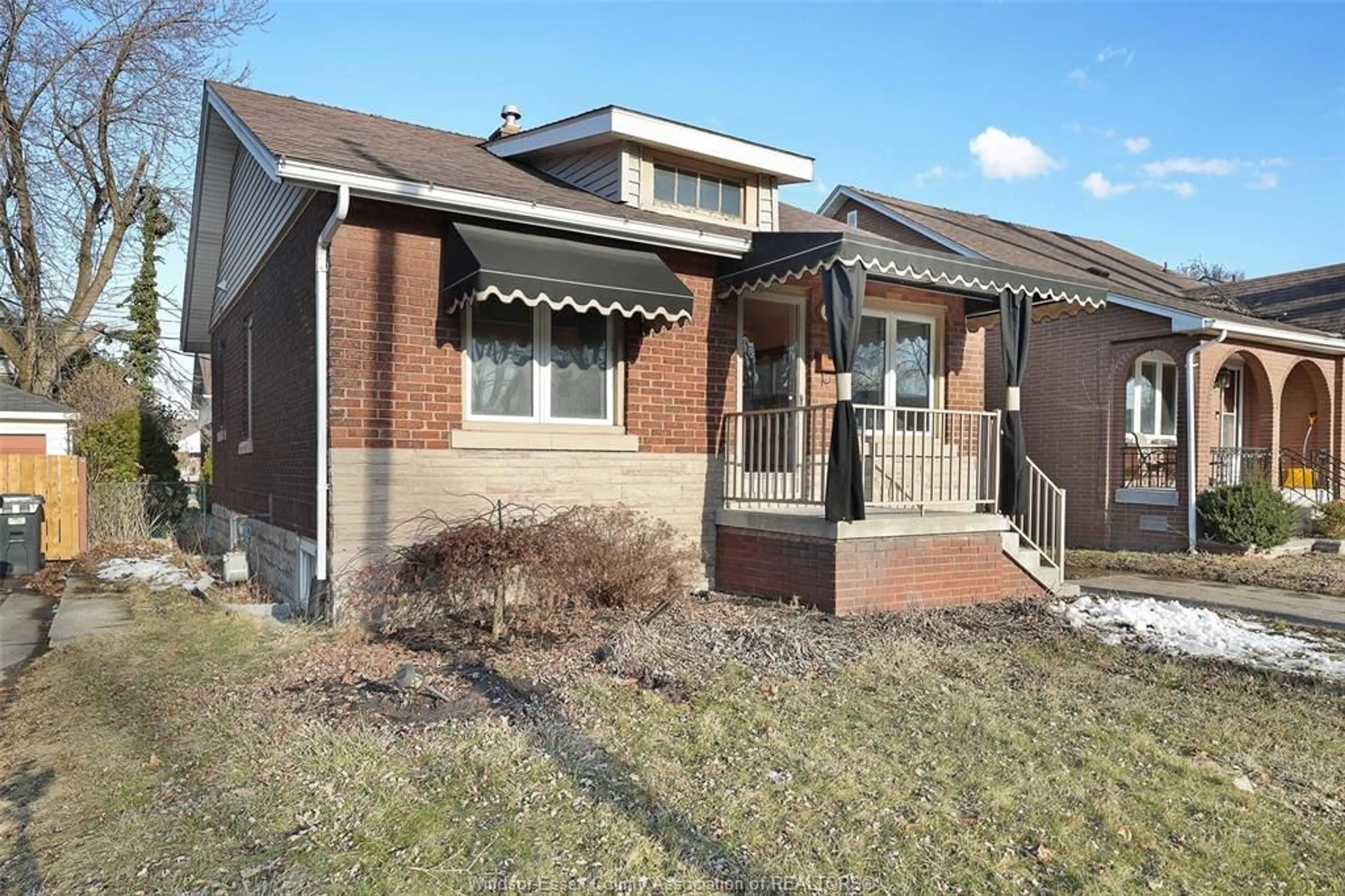 Home with brick exterior material, street for 1912 George, Windsor Ontario N8W4M1