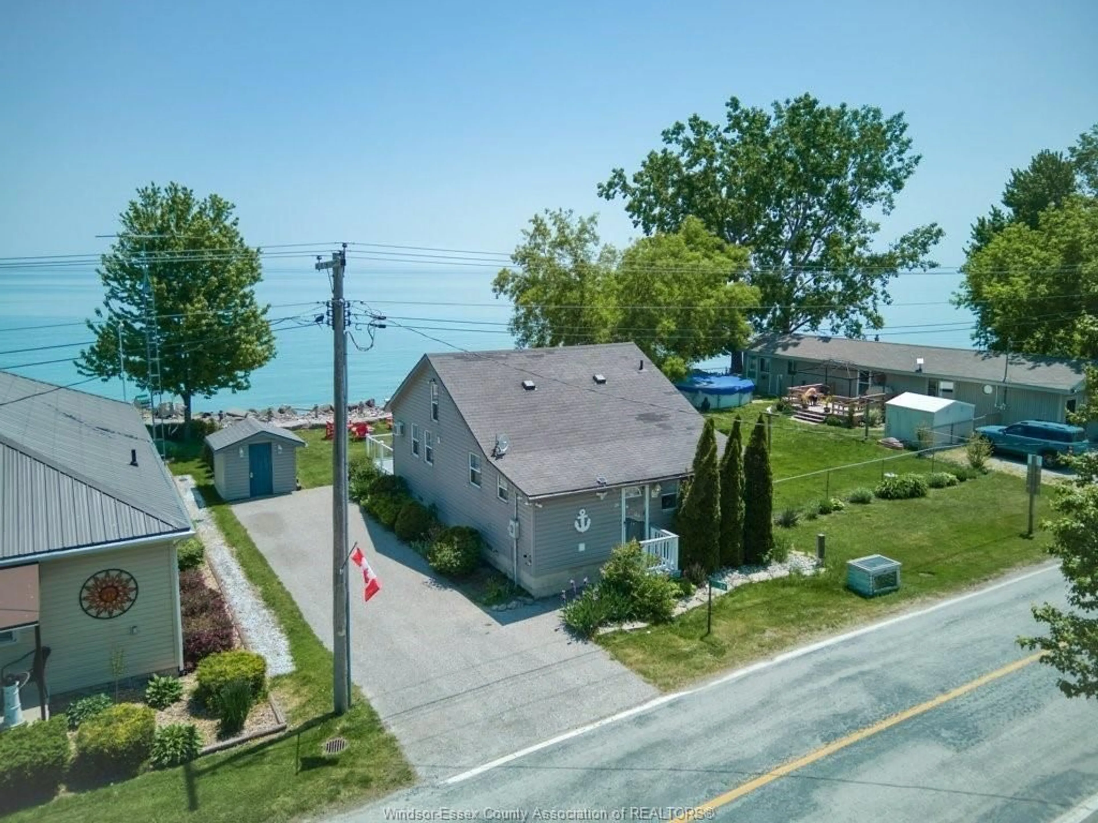 A pic from outside/outdoor area/front of a property/back of a property/a pic from drone, water/lake/river/ocean view for 24 PULLEY Rd, Leamington Ontario N0P 2P0