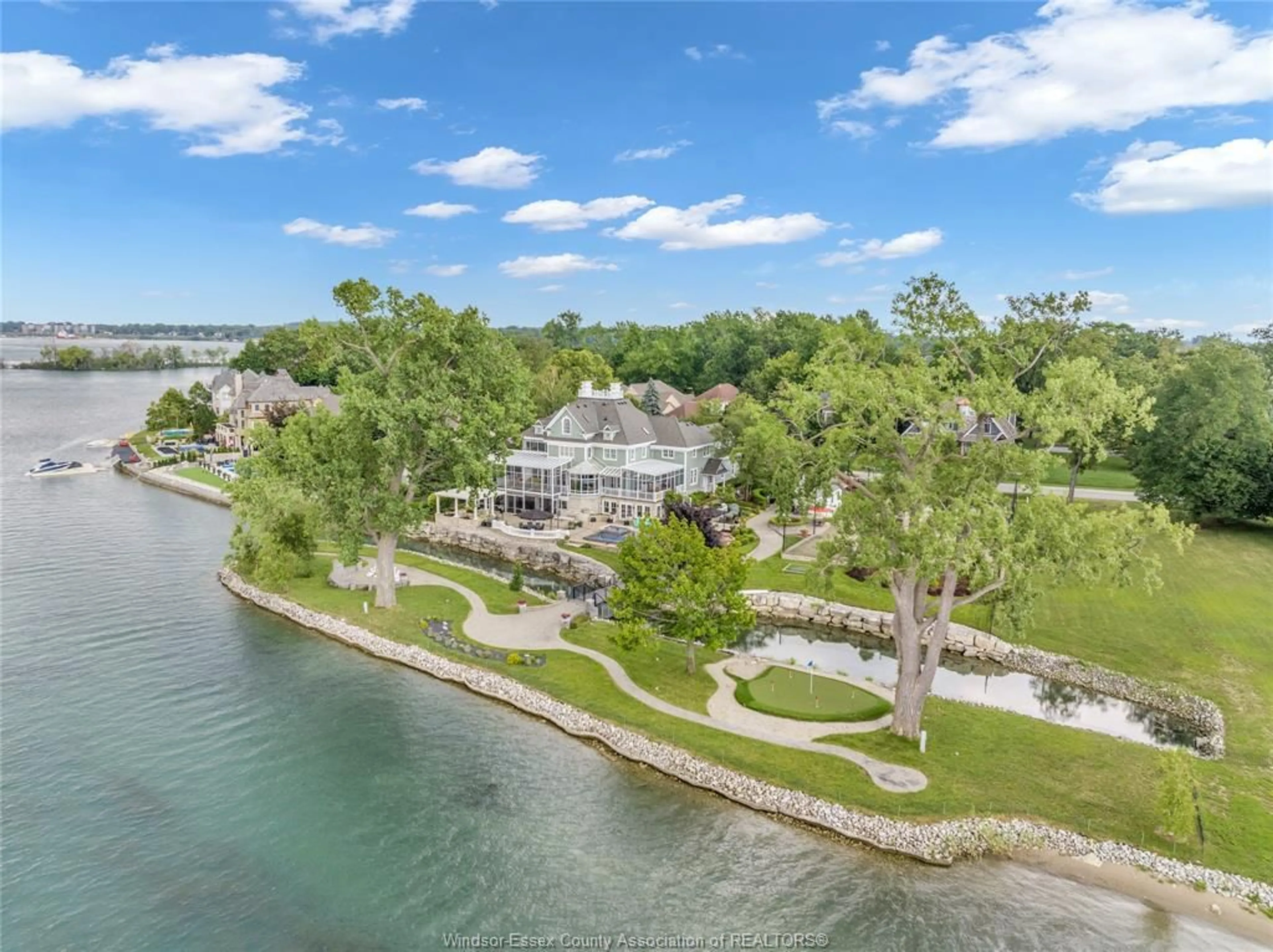 A pic from outside/outdoor area/front of a property/back of a property/a pic from drone, water/lake/river/ocean view for 344 & 338 CRYSTAL BAY Dr, Amherstburg Ontario N9V 4A7