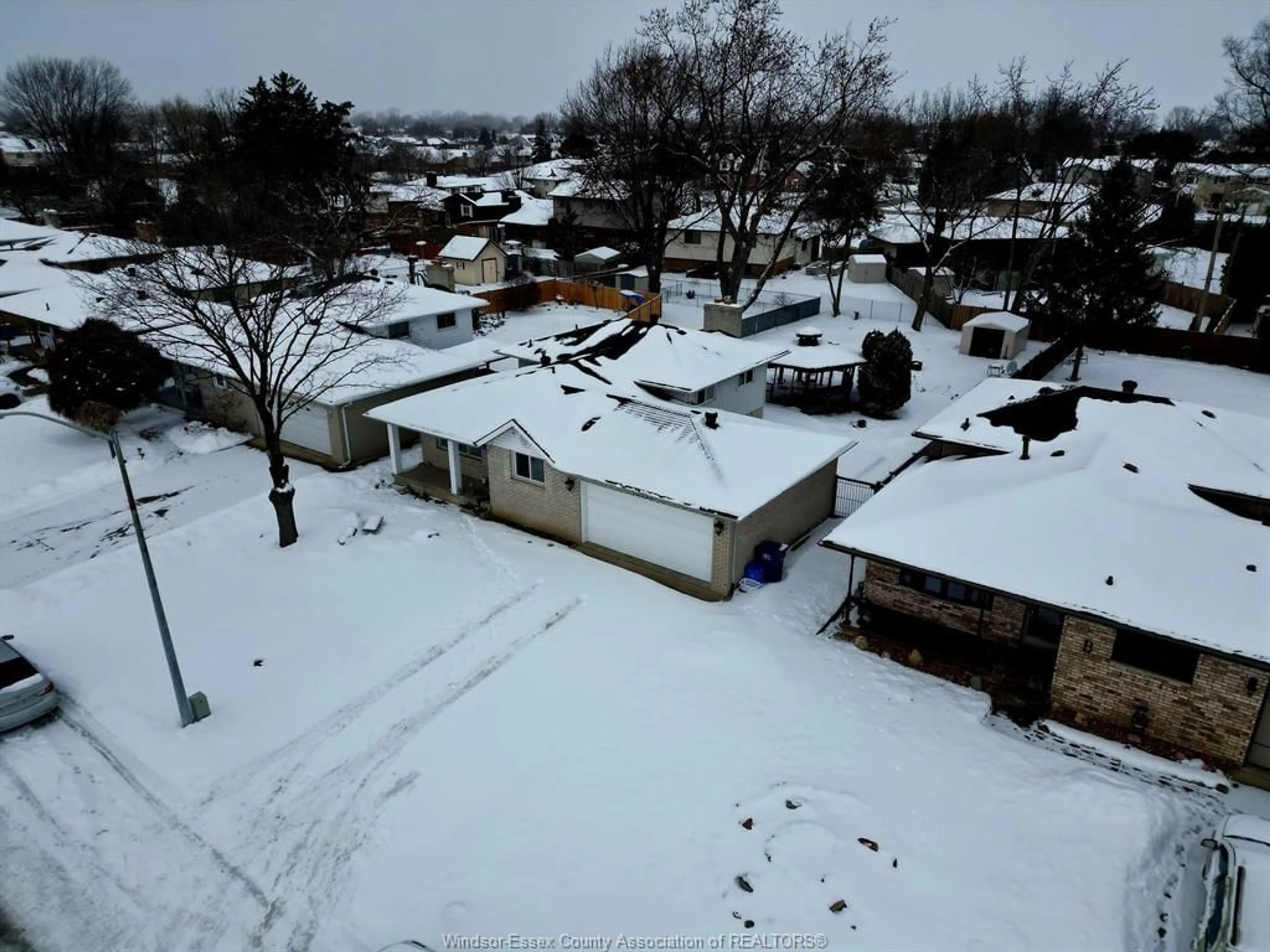 A pic from outside/outdoor area/front of a property/back of a property/a pic from drone, street for 12228 CEDARWOOD Dr, Tecumseh Ontario N8N 2W2