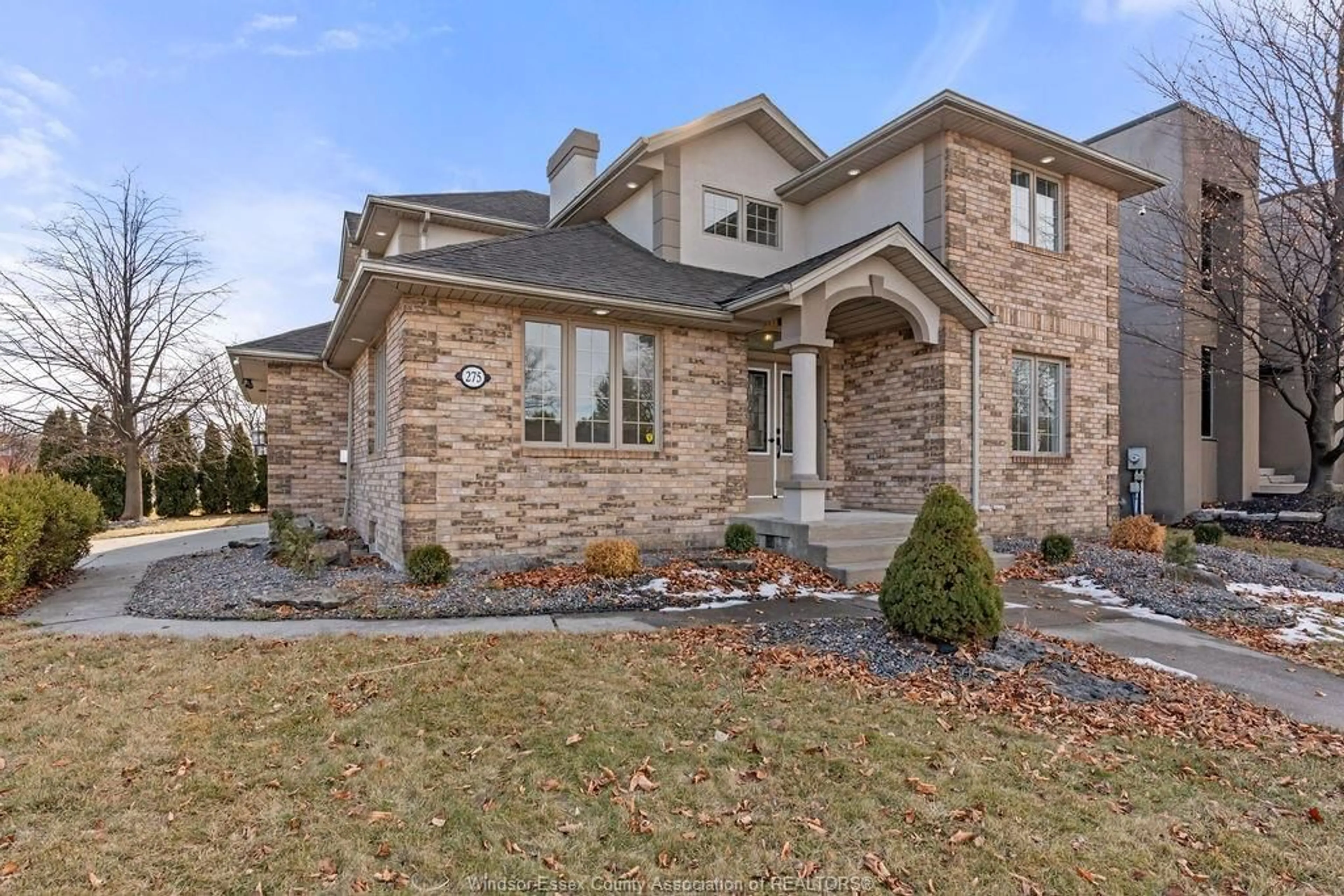 Home with brick exterior material, street for 275 RUSSELL WOODS Dr, Lakeshore Ontario N8N 4K4