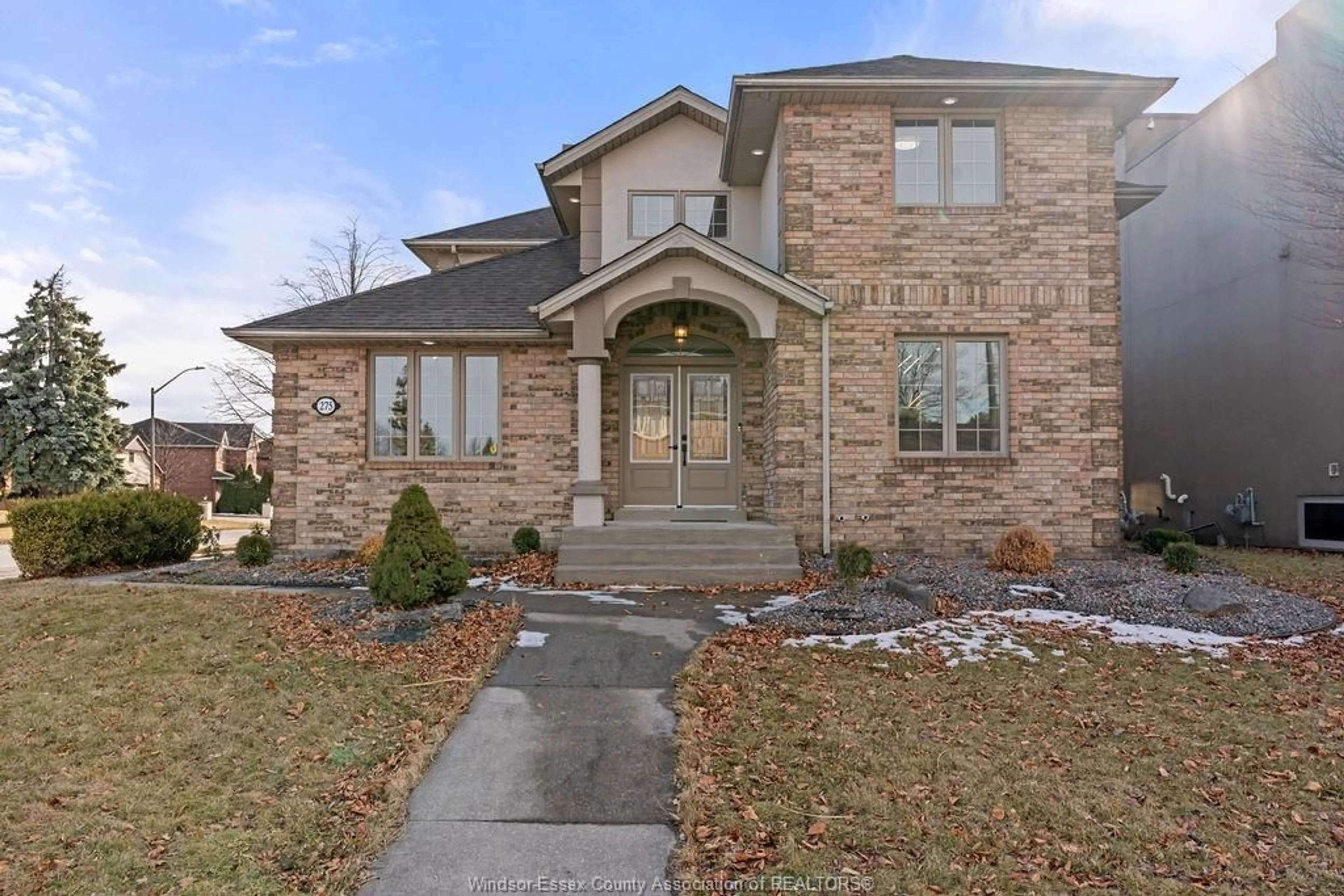 Home with brick exterior material, street for 275 RUSSELL WOODS Dr, Lakeshore Ontario N8N 4K4