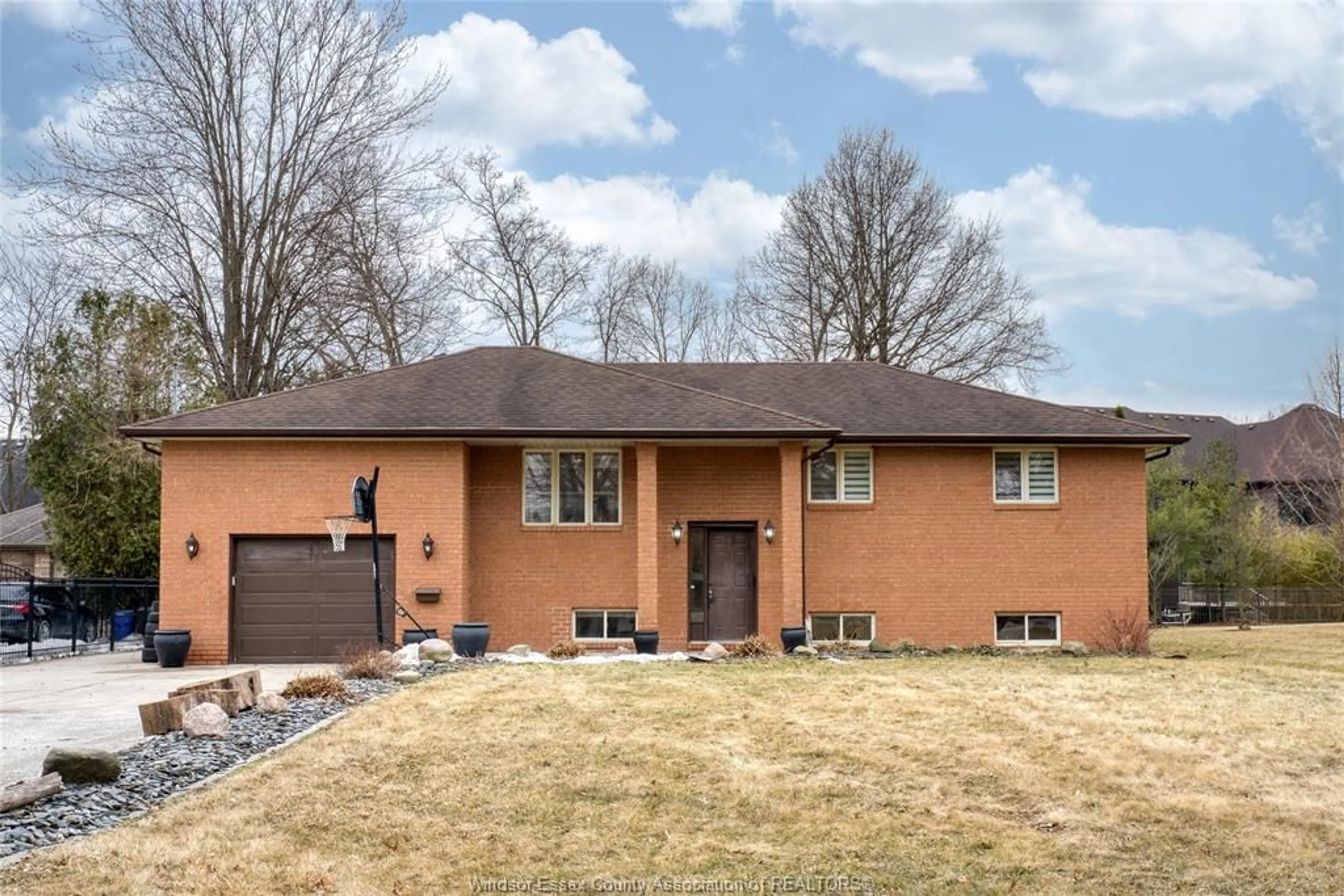 Home with brick exterior material, street for 1340 REAUME Rd, LaSalle Ontario N9J 1C2