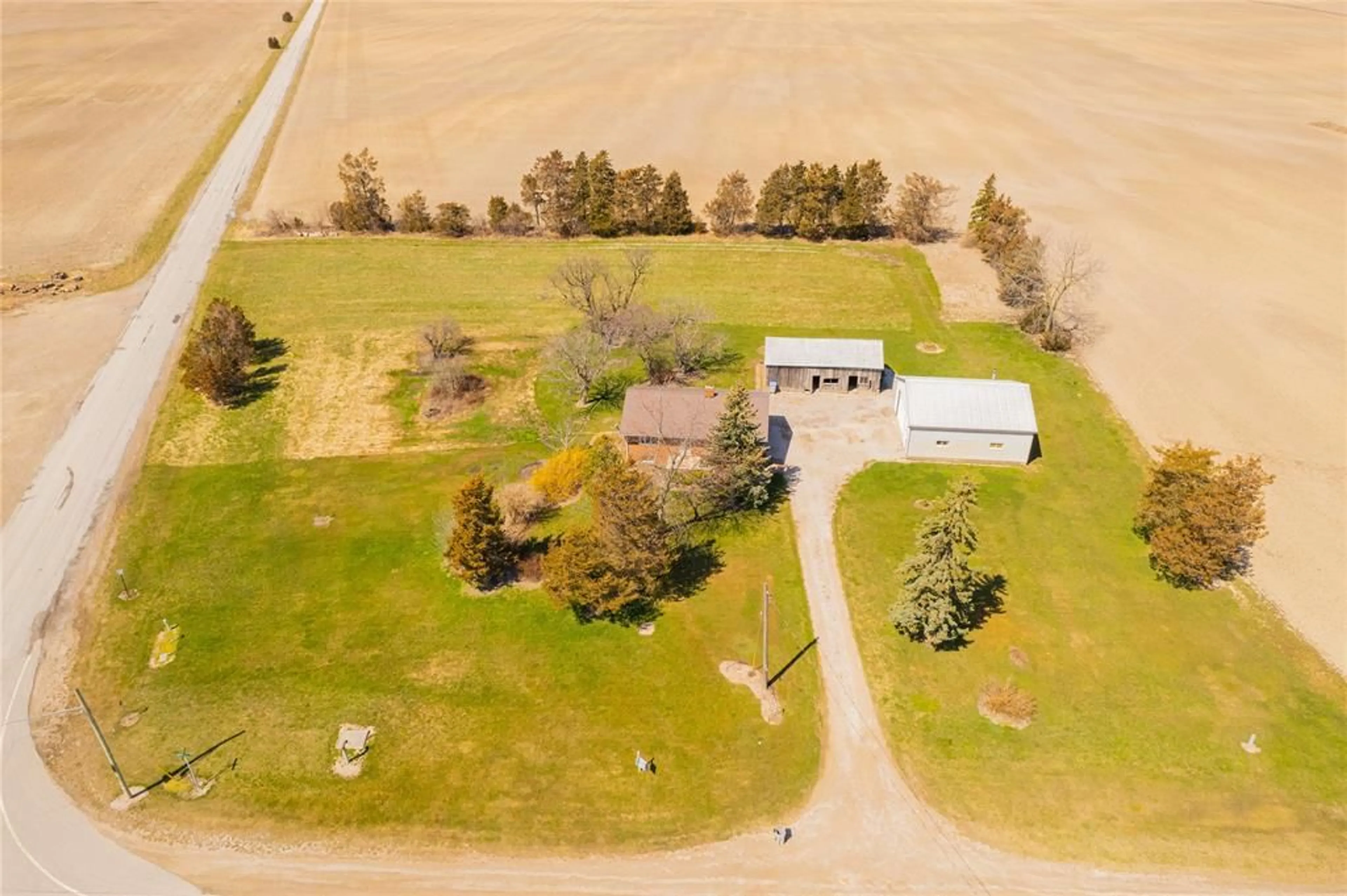 A pic from outside/outdoor area/front of a property/back of a property/a pic from drone, unknown for 5726 LAKESHORE Rd, Bosanquet Ontario N0N 1J7