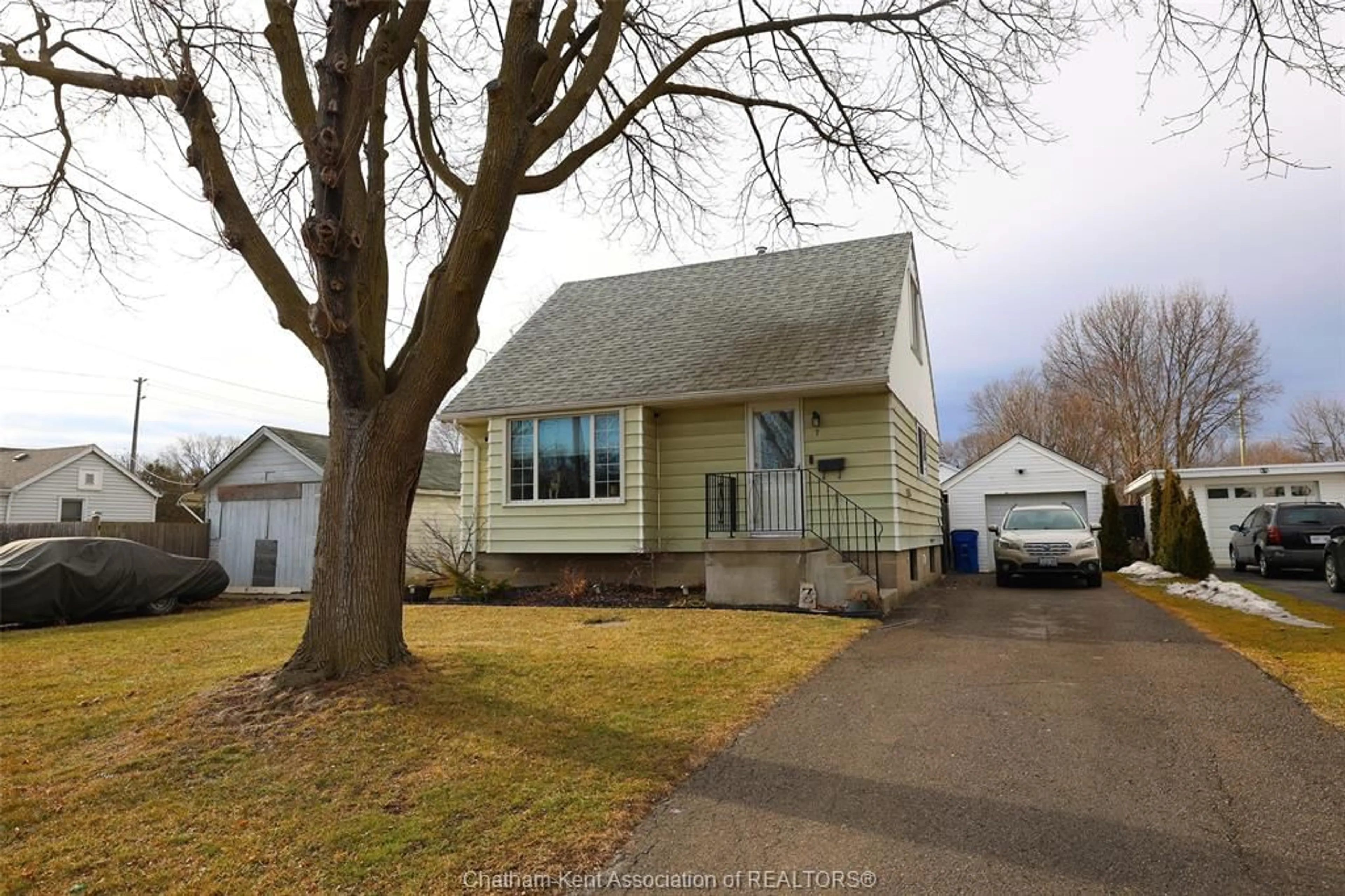 Home with vinyl exterior material, street for 7 Degraeve Dr, Chatham Ontario N7L1N8