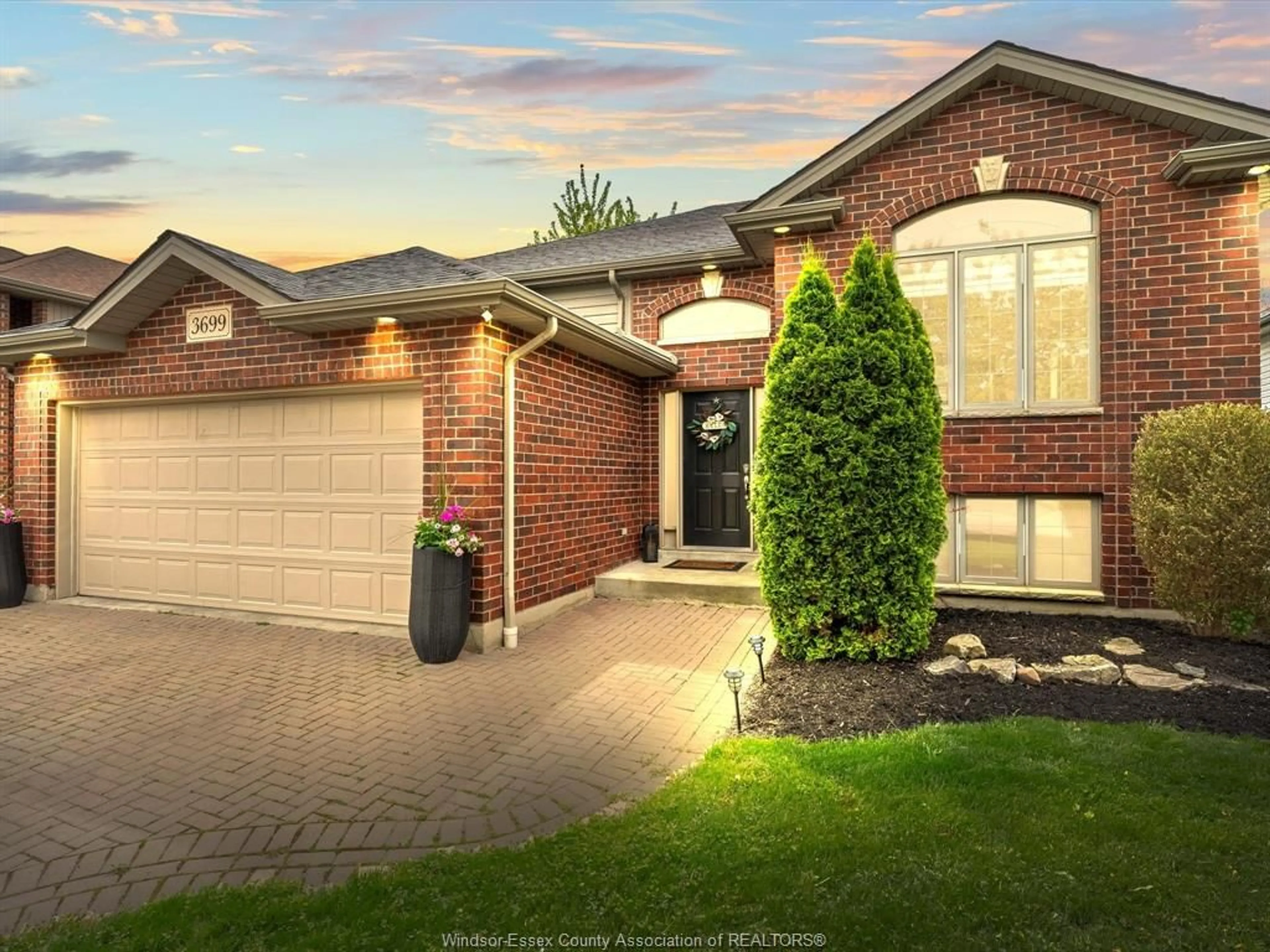 Home with brick exterior material, street for 3699 DEERBROOK Dr, Windsor Ontario N8R 2E6