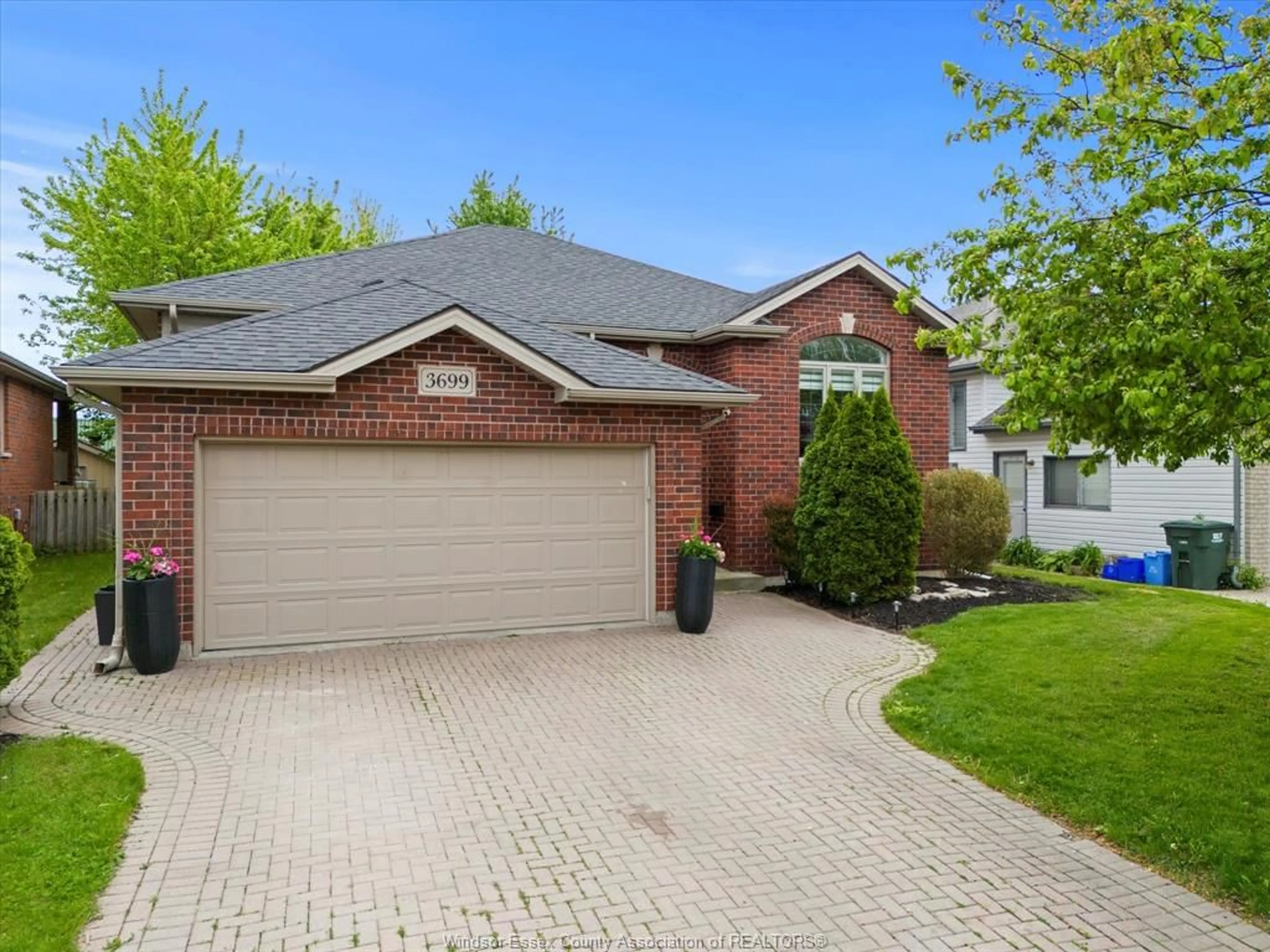 Home with brick exterior material, street for 3699 DEERBROOK Dr, Windsor Ontario N8R 2E6