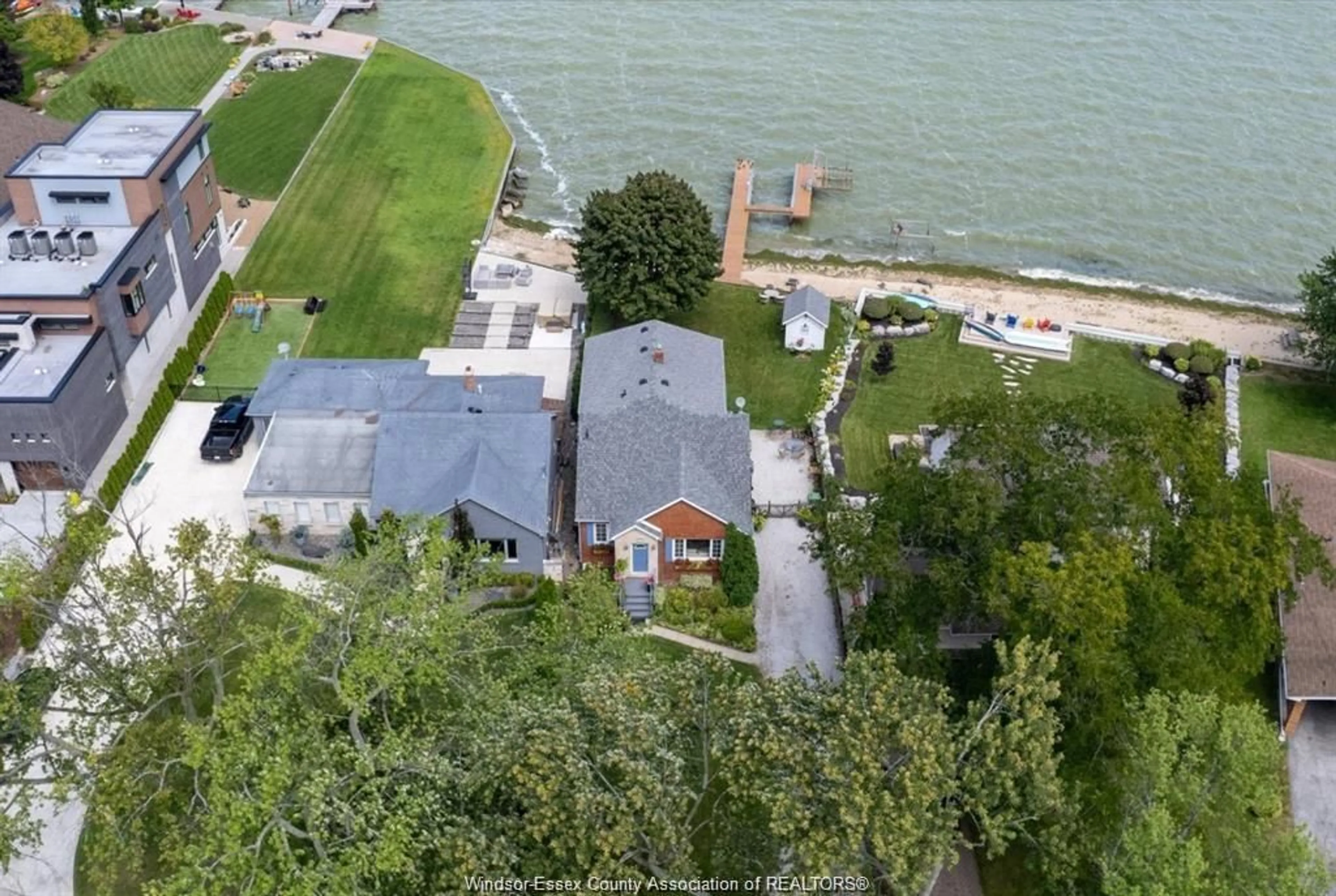 A pic from outside/outdoor area/front of a property/back of a property/a pic from drone, water/lake/river/ocean view for 13902 RIVERSIDE Dr, Tecumseh Ontario N8N 1B6