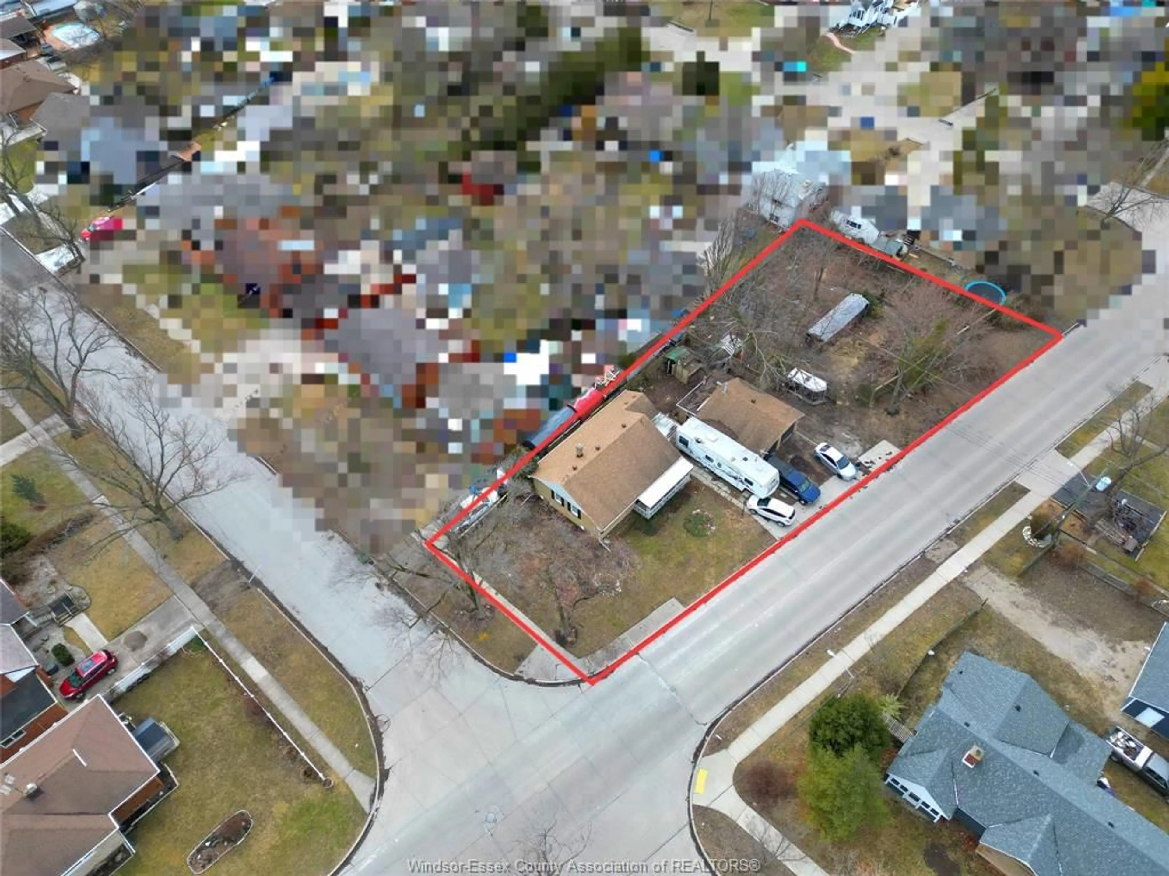 A pic from outside/outdoor area/front of a property/back of a property/a pic from drone, street for 1007 Janisse, Windsor Ontario N8S 2V9