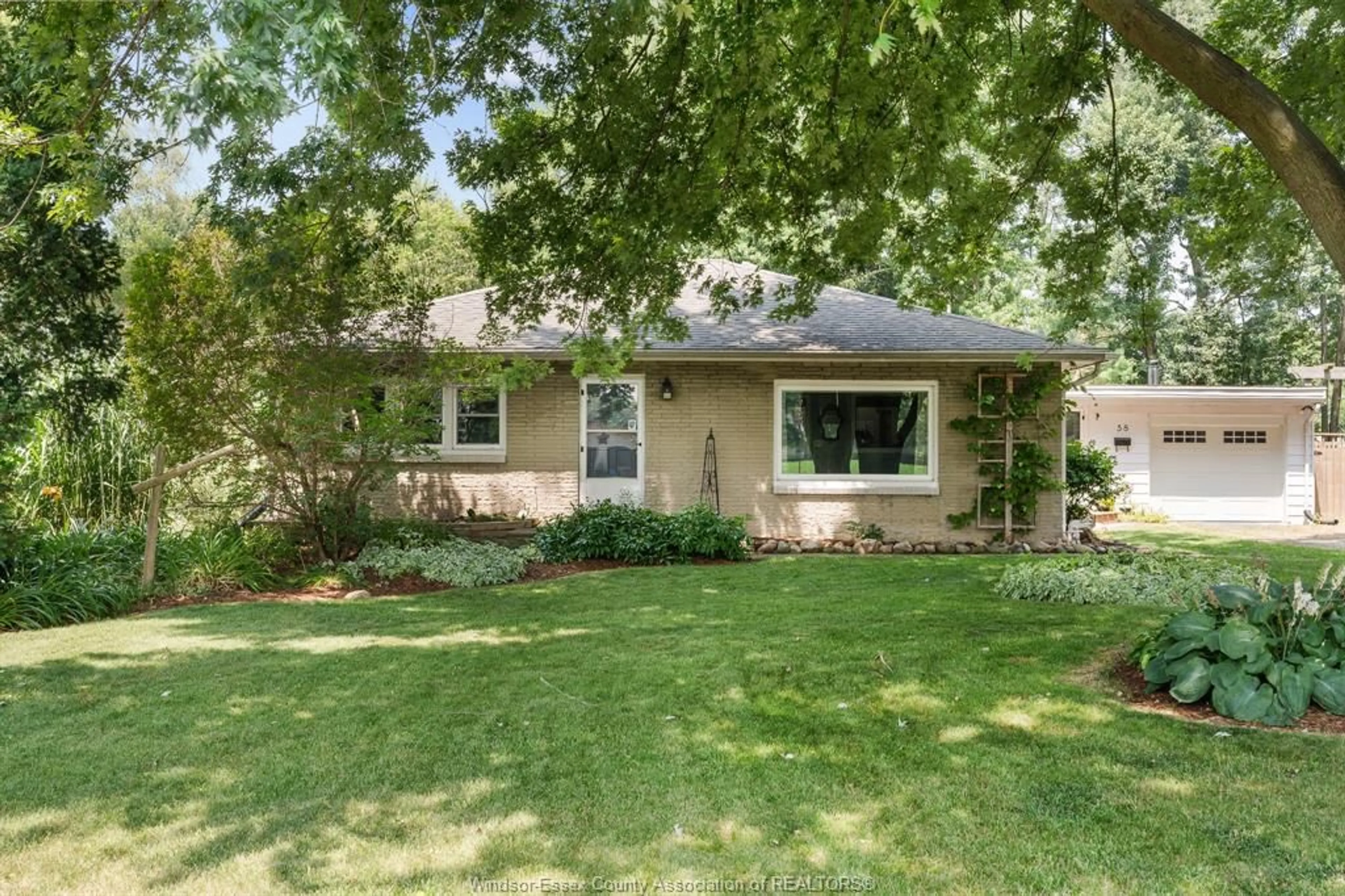 Home with brick exterior material, street for 58 Road 3 W, Kingsville Ontario N9Y 3A2