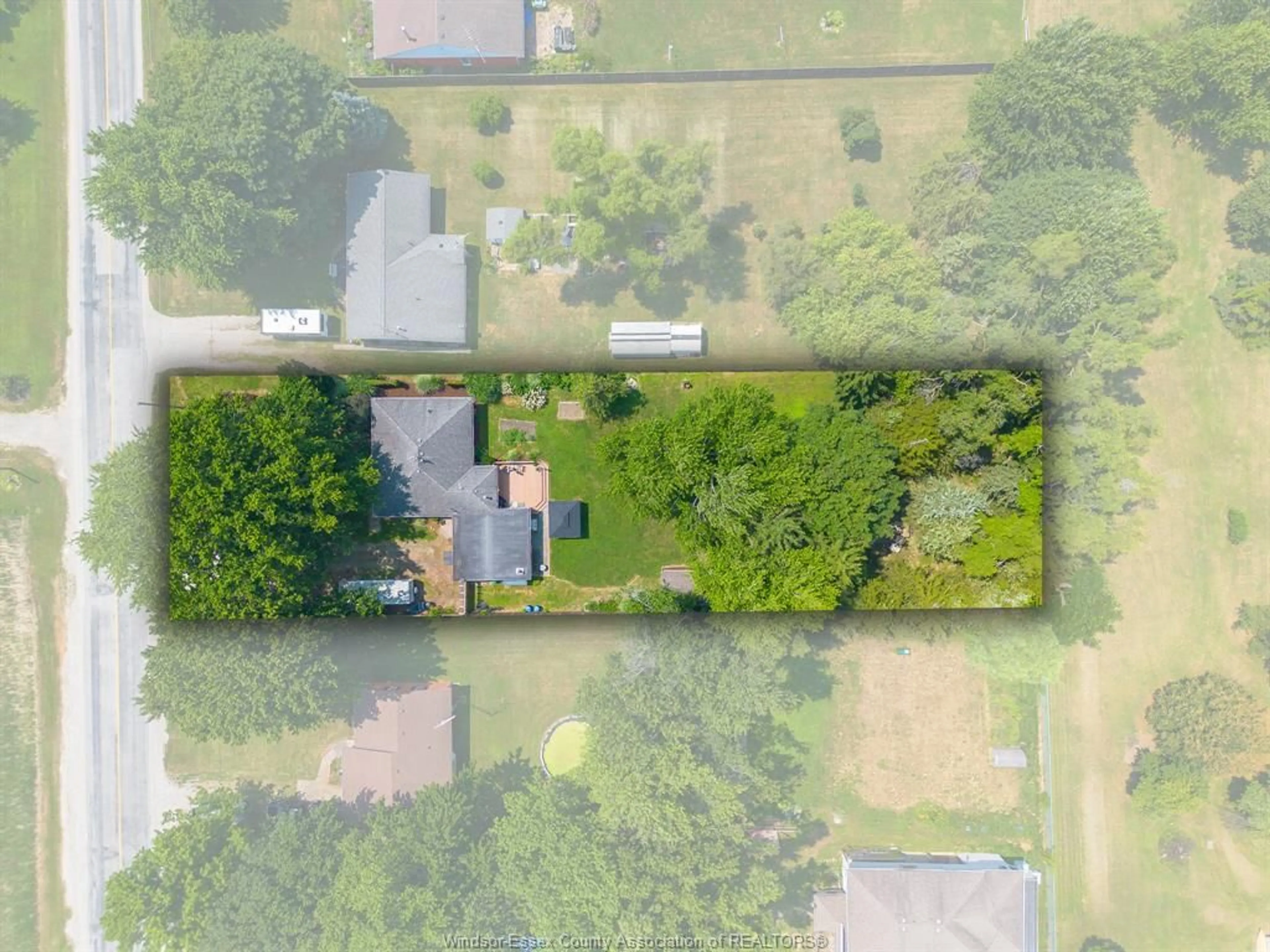 A pic from outside/outdoor area/front of a property/back of a property/a pic from drone, unknown for 58 Road 3 W, Kingsville Ontario N9Y 3A2
