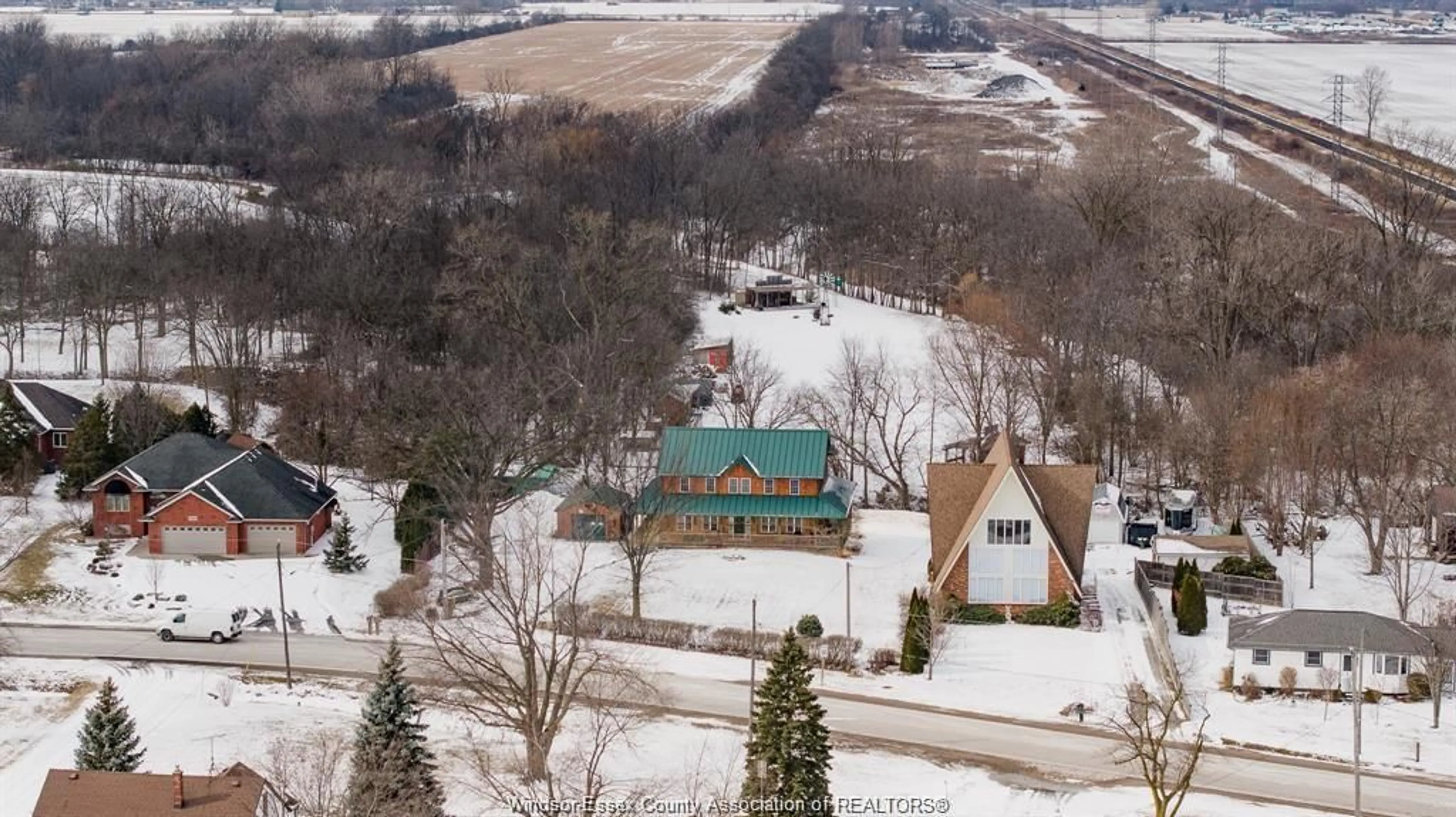 A pic from outside/outdoor area/front of a property/back of a property/a pic from drone, mountain view for 453 ELMSTEAD, Lakeshore Ontario N8N 2L9