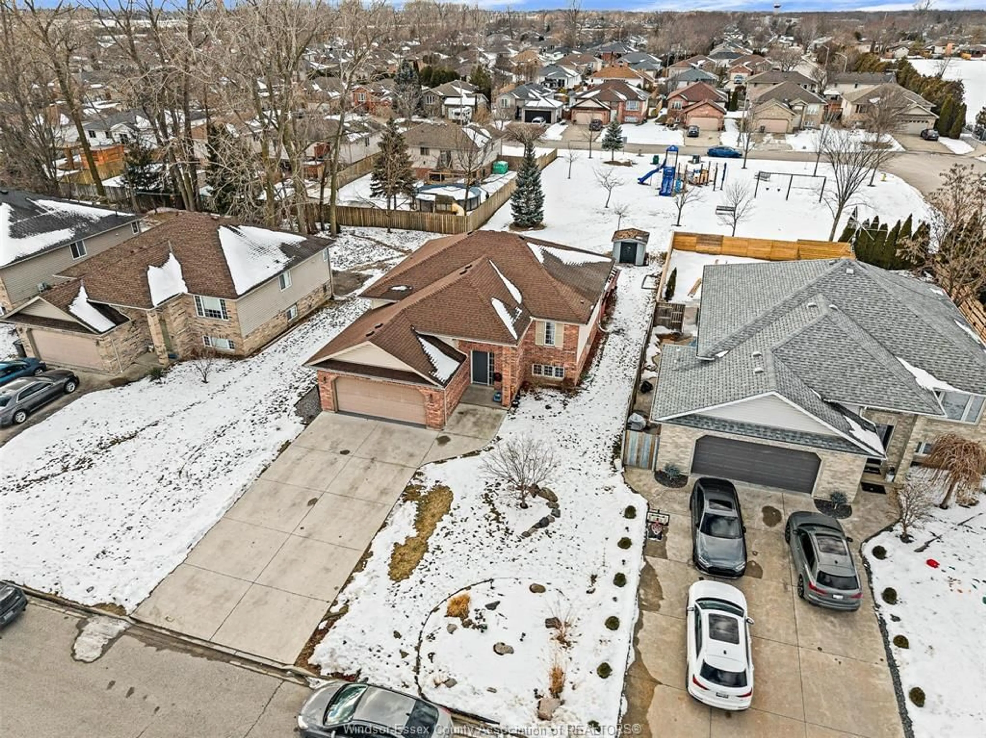 A pic from outside/outdoor area/front of a property/back of a property/a pic from drone, street for 717 HELENA Cres, Belle River Ontario N8L 0P7